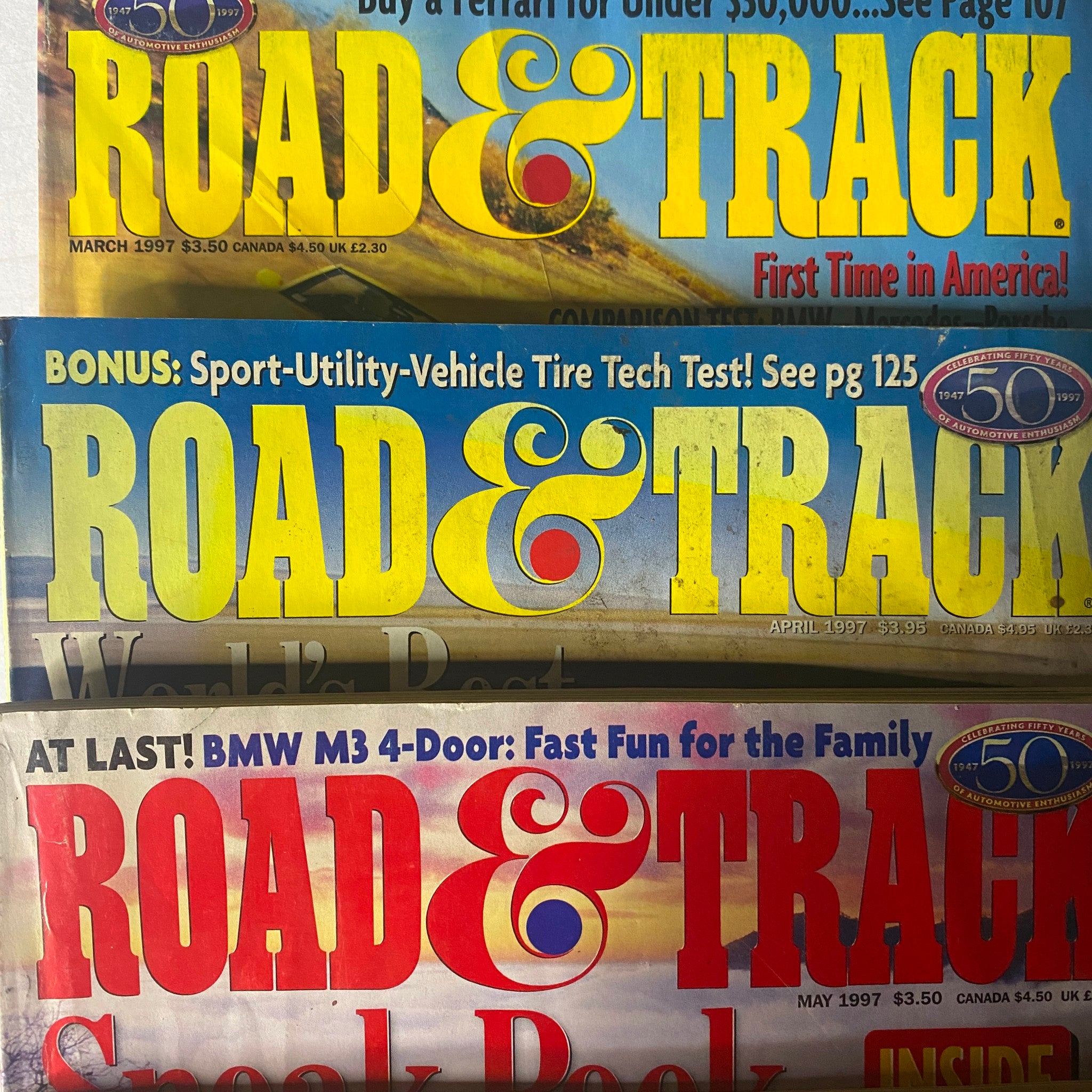 Snapshot of Road & Track Magazine issues from 1997, including March and April covers, illustrating automotive reviews and features from the 90s.