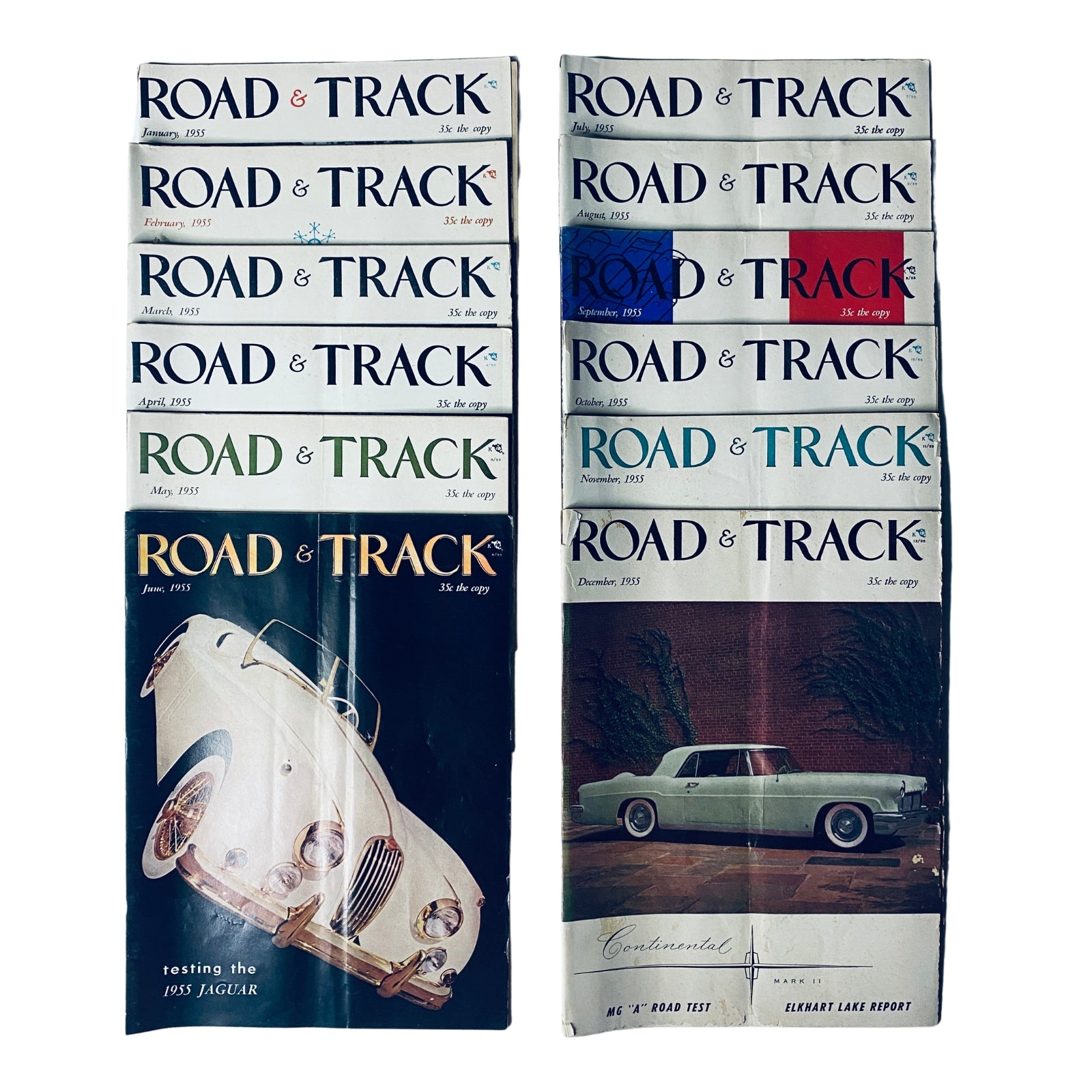 Lot of 12 Road & Track Magazines 1955 showcasing covers from January to December, featuring classic car designs and racing themes, perfect for vintage car enthusiasts.