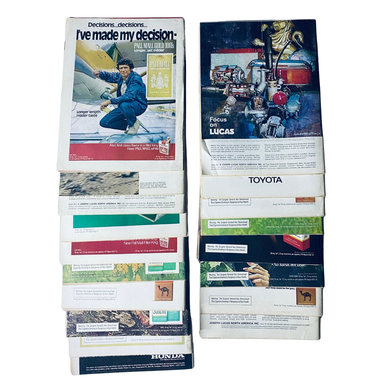 Lot of 18 Road & Track Magazines 1972–1973 featuring advertisements and articles related to automotive brands, displaying the magazine's back covers and marketing content.