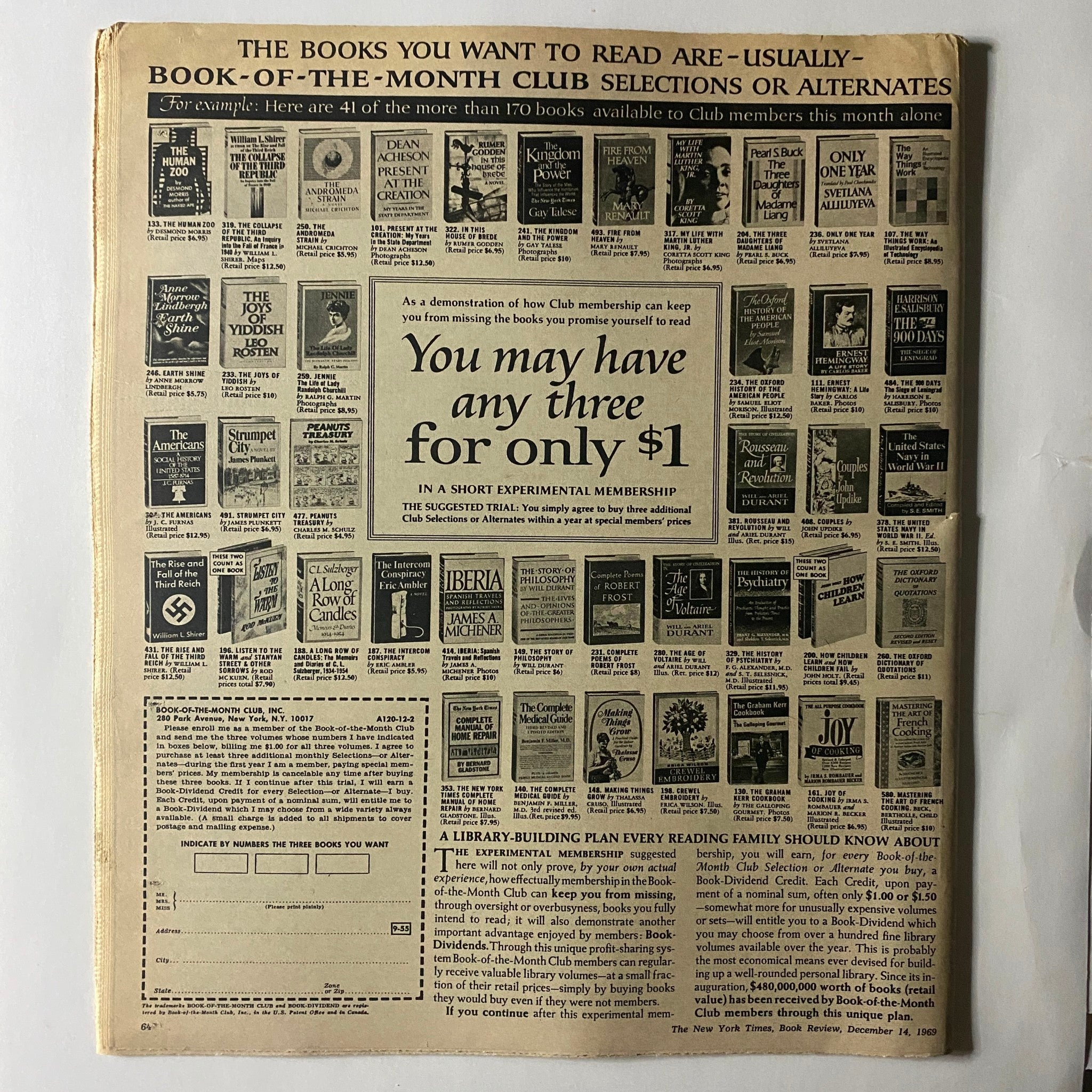 The back cover of The New York Times Book Review December 14, 1969, showcasing book advertisements and offers from the Book-of-the-Month Club, highlighting literary selections available at the time.