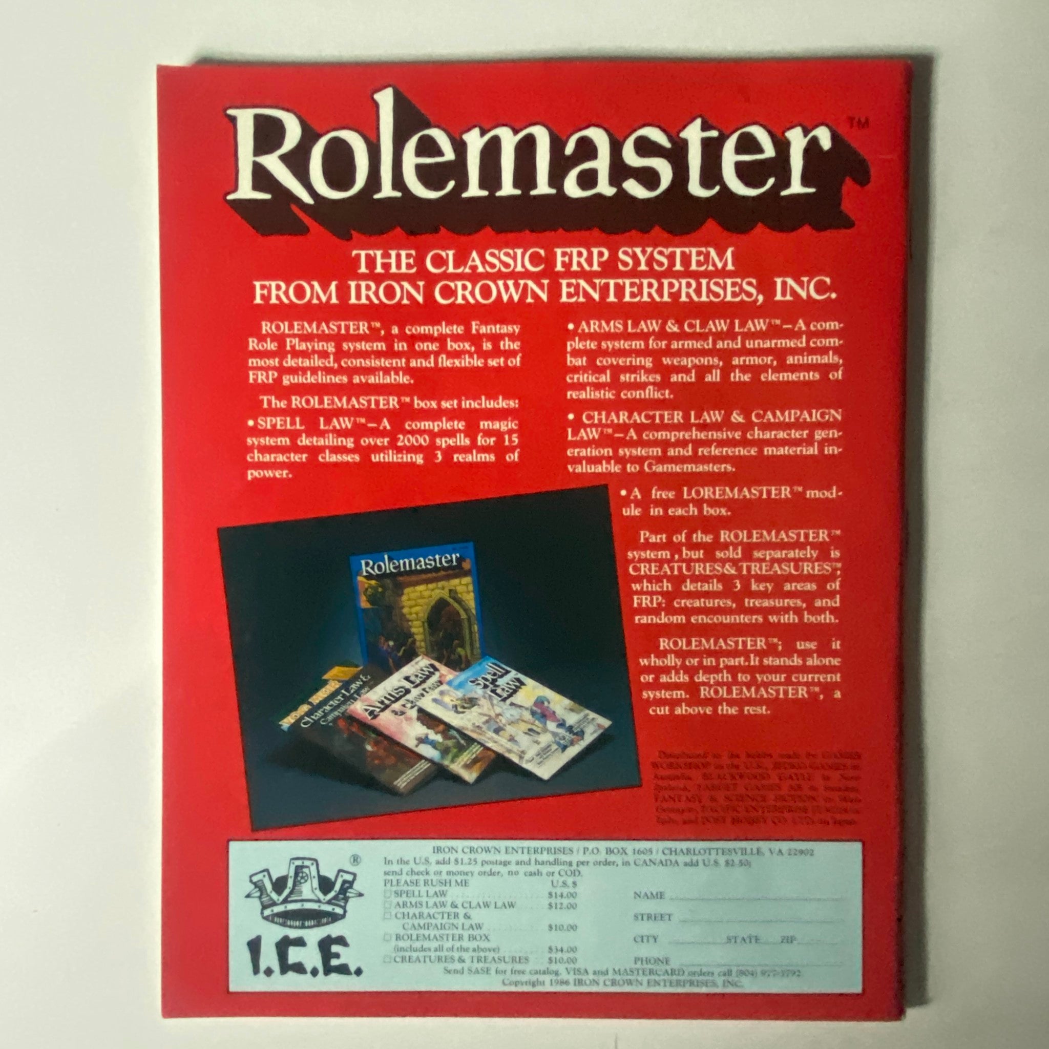 Back cover of VTG Dragon Magazine March 1986 #107 showcasing the Rolemaster FRP system from Iron Crown Enterprises, highlighting various gaming elements and advertisements.