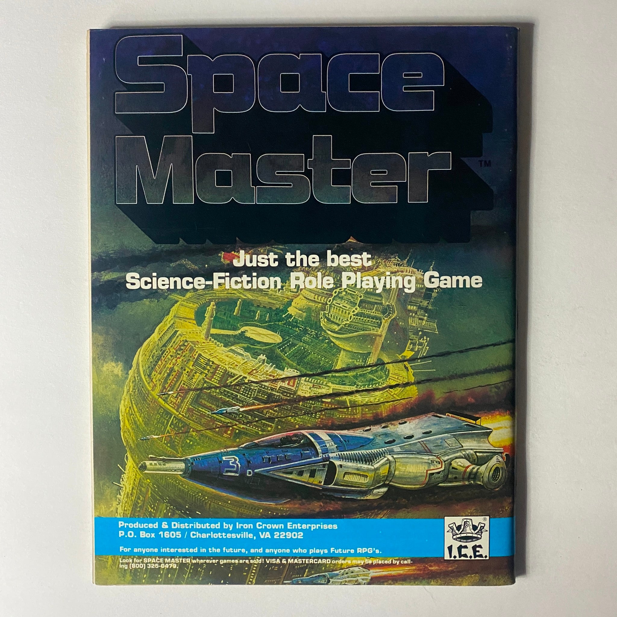 Cover of Space Master game, labeled 'Just the best Science-Fiction Role Playing Game,' depicting a futuristic spaceship and cityscape, relevant to gaming enthusiasts.