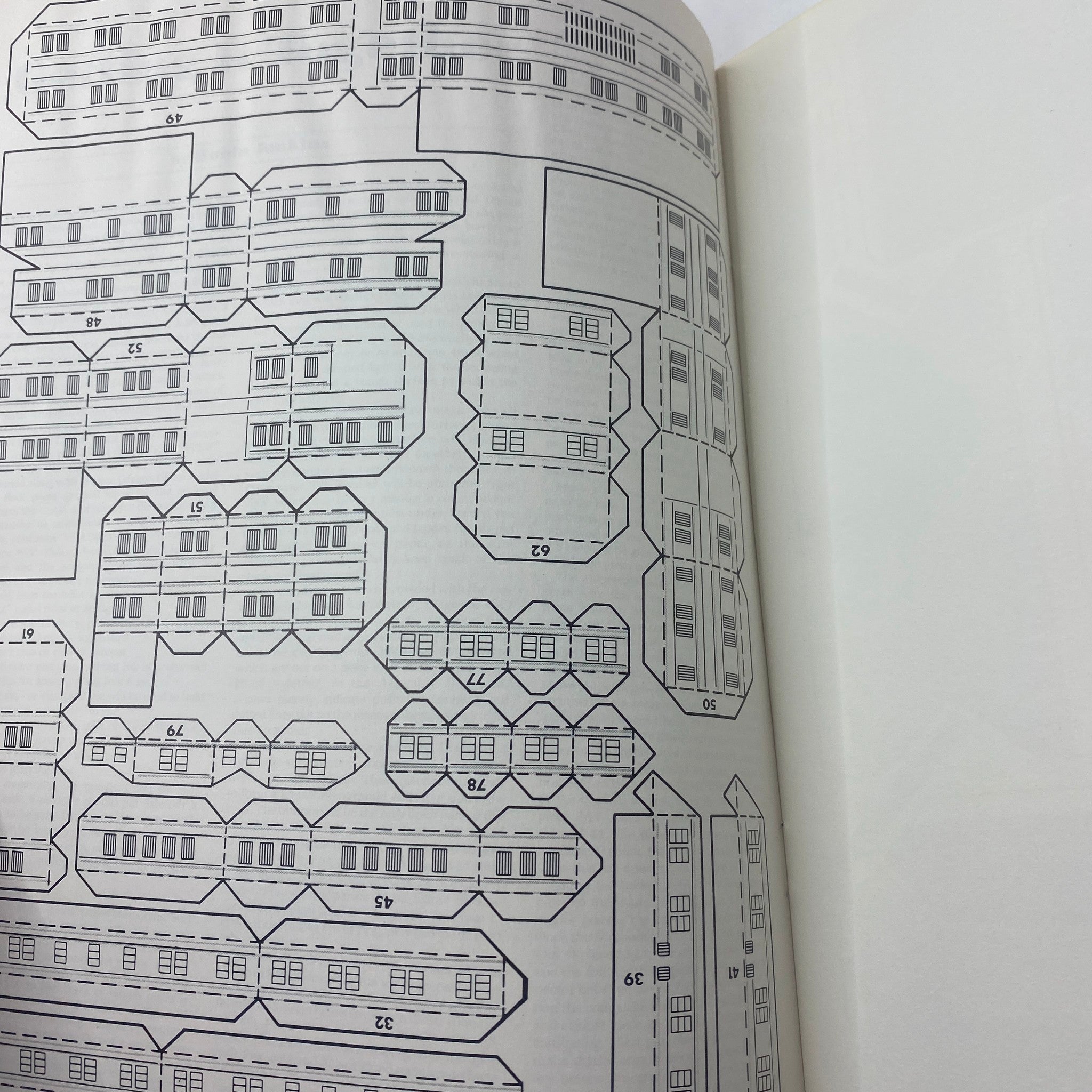 Paper model layout found in Dragon Magazine May 1987 #121, intended for use in tabletop role-playing adventures.