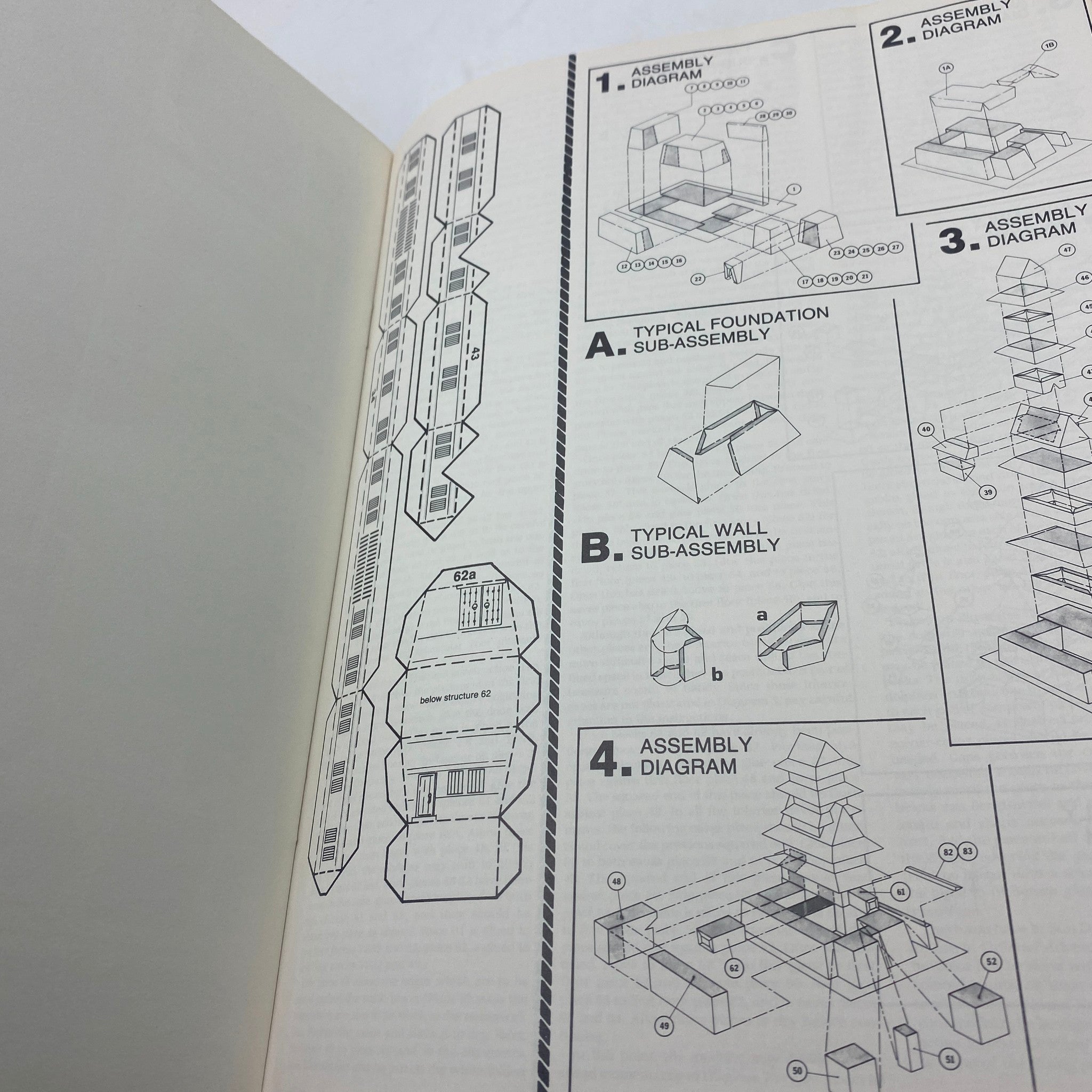 Dragon Magazine May 1987 	Interior page with assembly diagrams and structures for paper models, reflecting the intricate design used in classic tabletop gaming.