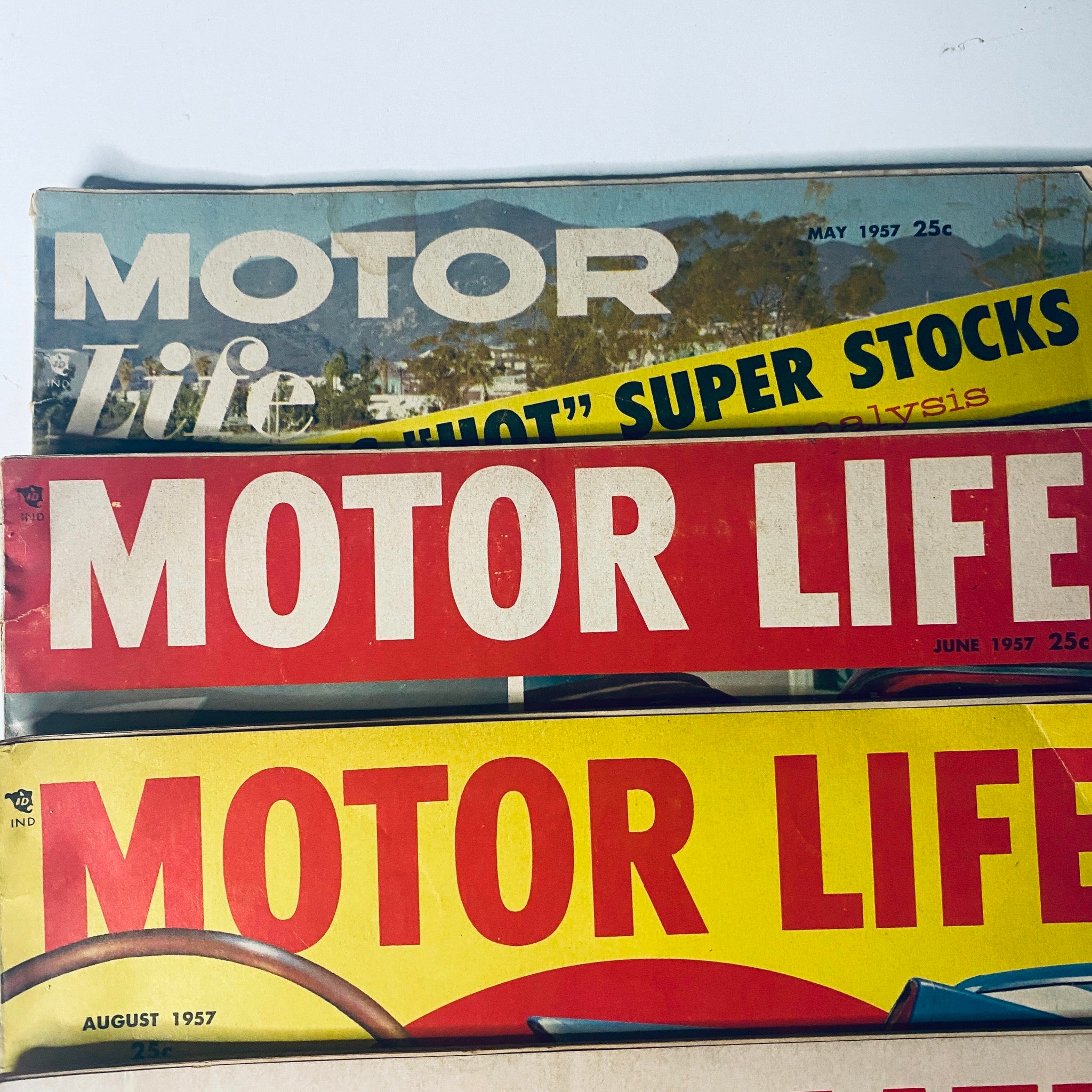 Cover images of Motor Life Magazine from May to August 1957. Highlights include articles on 'hot' super stocks and stunning visuals from the automotive world.