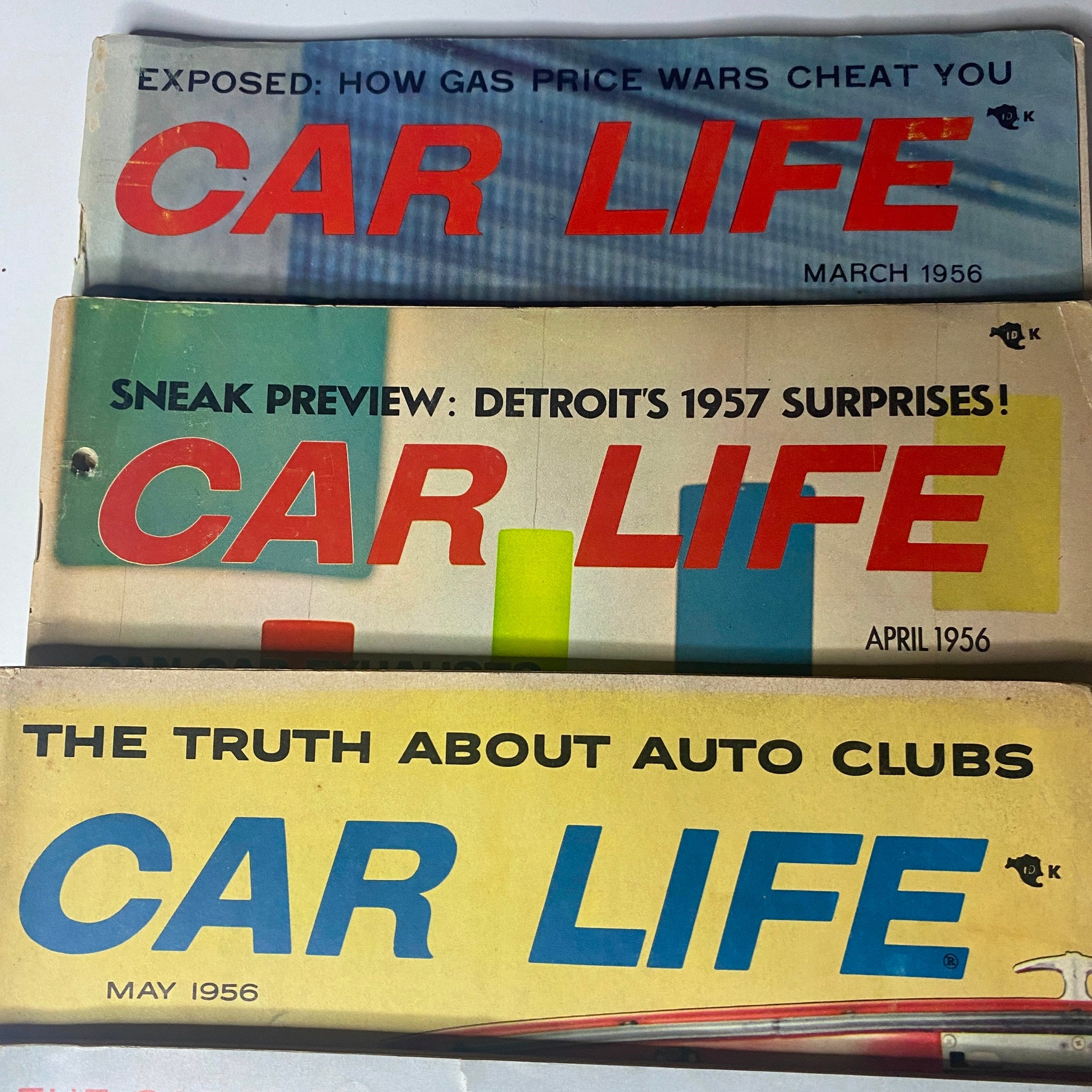 Cover of Car Life magazine from March 1956, featuring the title and topics like 'Exposed: How Gas Price Wars Cheat You' and a sneak peek into Detroit's 1957 surprises. Lot of 10 Car Life The Family Auto Magazine 1956 March - December.