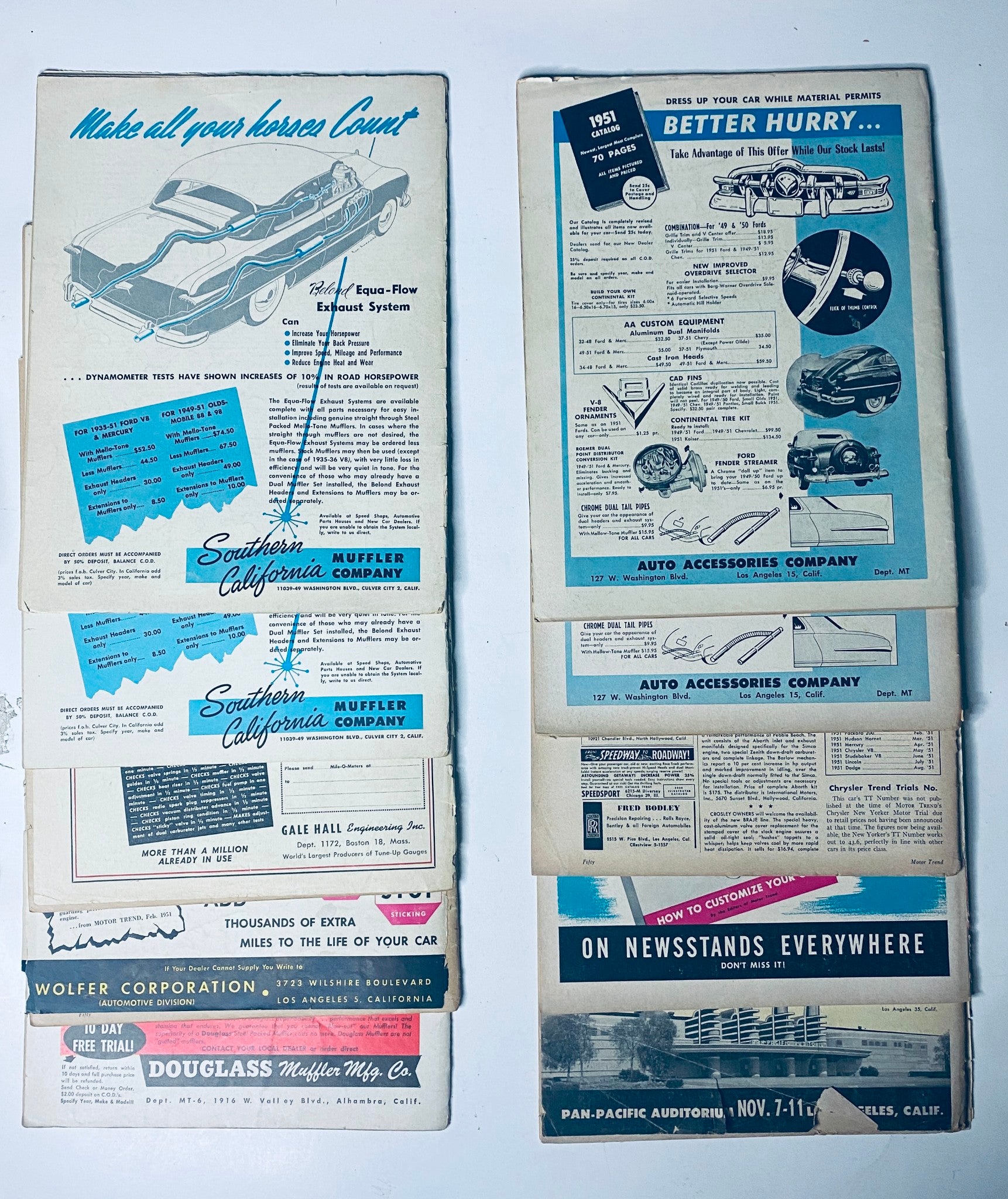 Page layout showcasing vintage advertisements from the Lot of 9 Motor Trend Magazine 1951 March - November, highlighting automotive products and services.