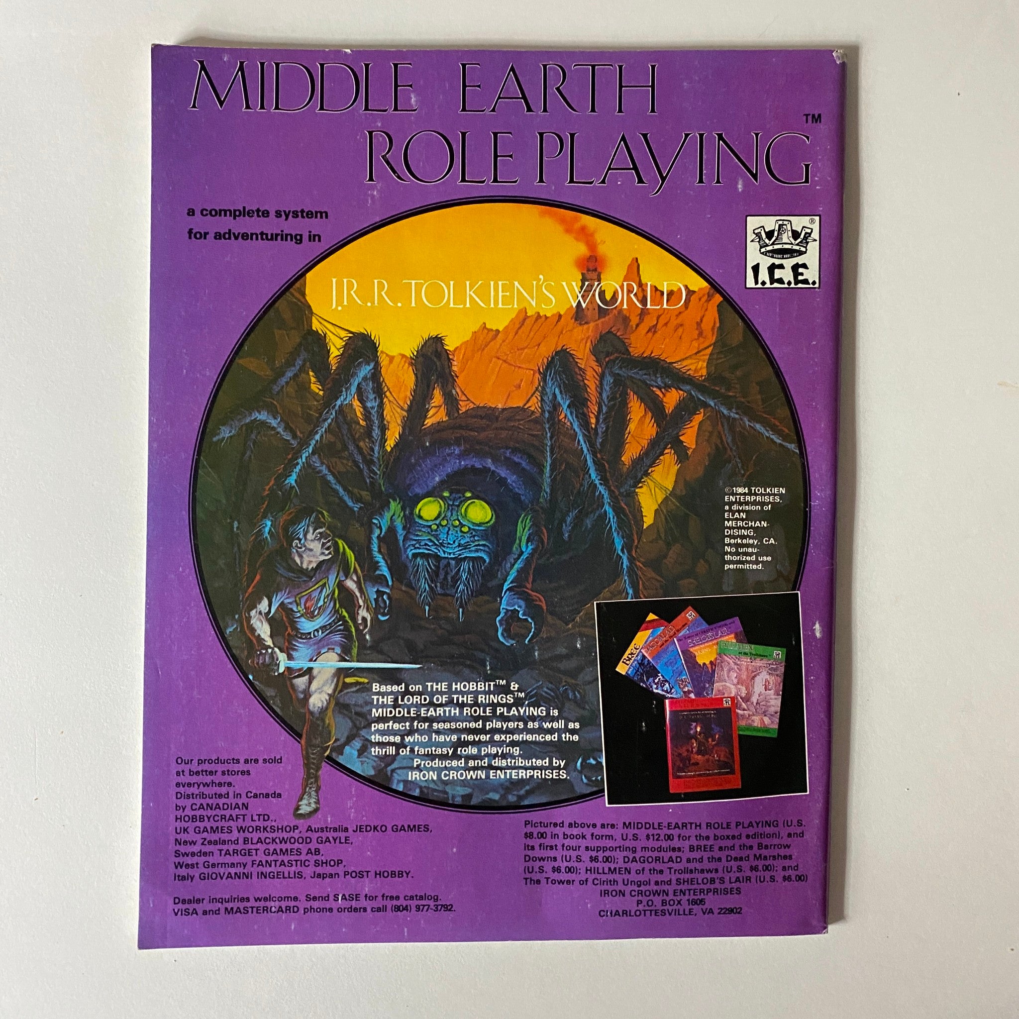 Back cover of a Middle Earth Role Playing magazine featuring a colorful illustration and promotional material, highlighting J.R.R. Tolkien's world.