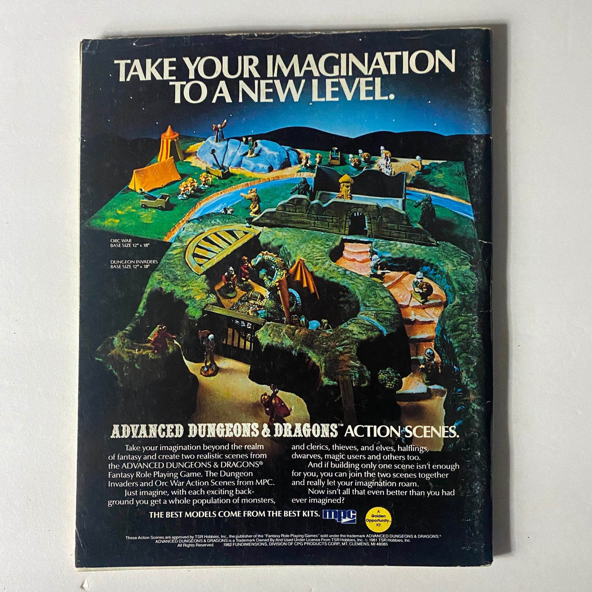 Back cover of VTG Dragon Magazine December 1982 #68 promoting Advanced Dungeons & Dragons action scenes with colorful fantasy imagery.