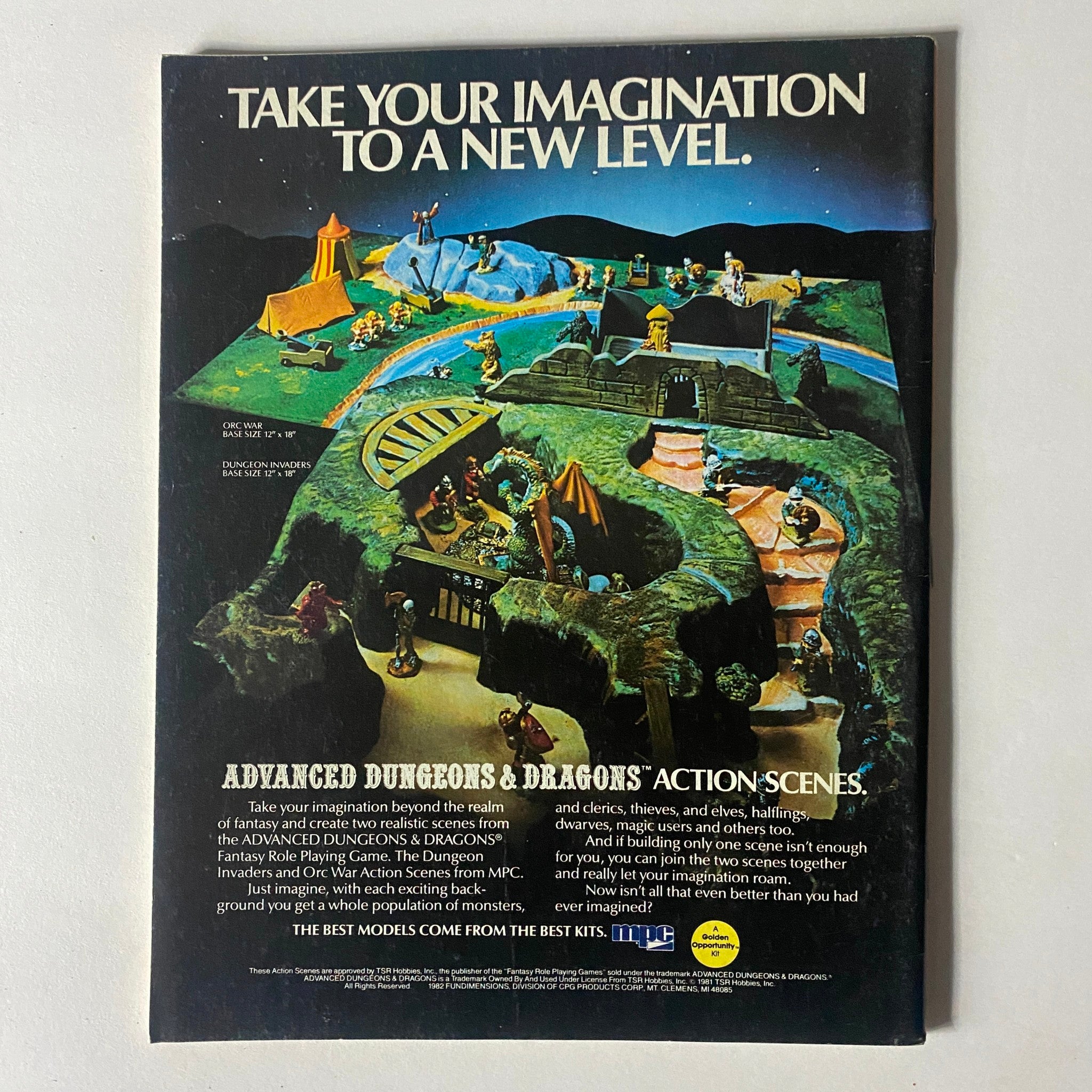 Back cover of VTG Dragon Magazine November 1982 #67 with an advertisement for Advanced Dungeons & Dragons action scenes, promoting imaginative play.