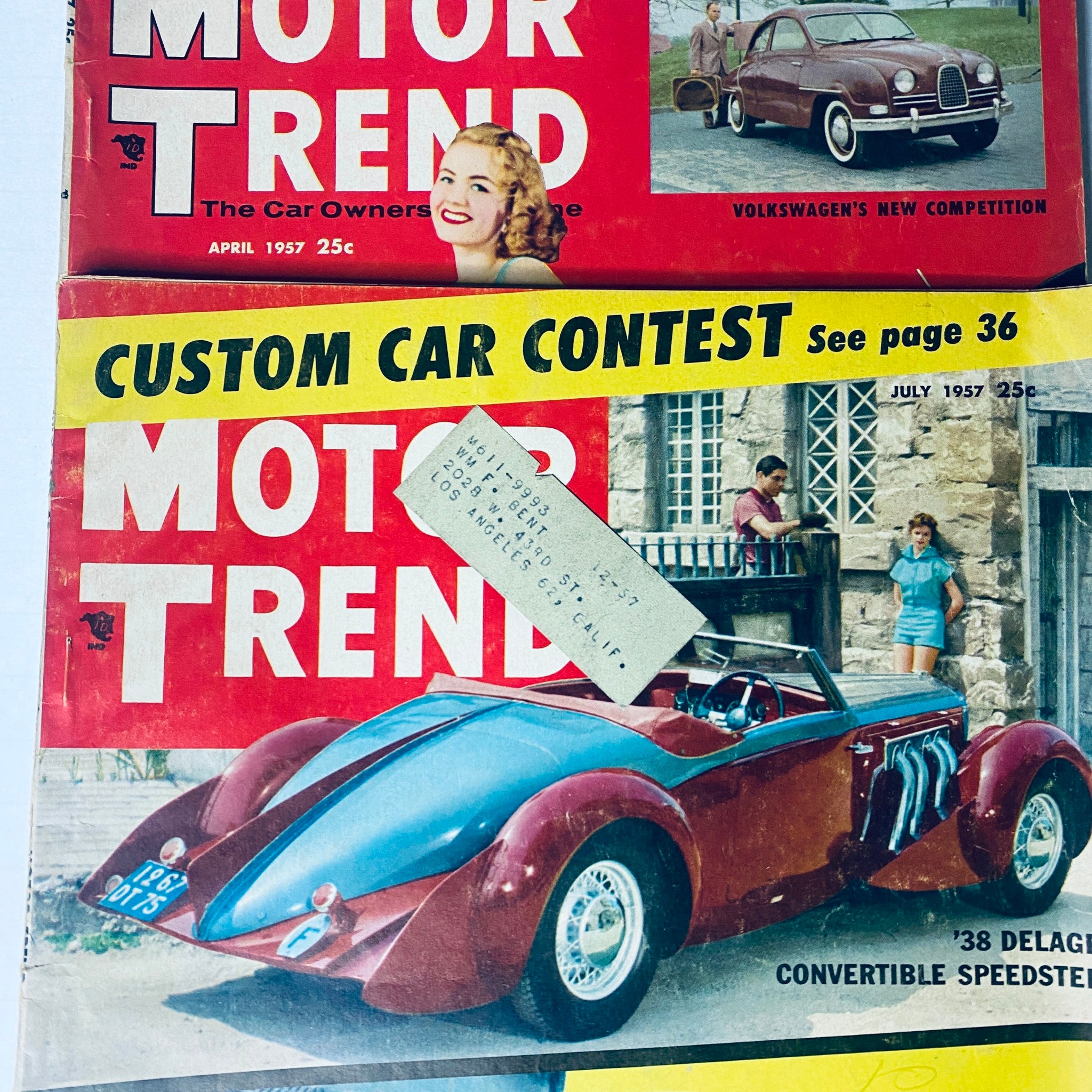 Close-up of Motor Trend Magazine April 1957 issue showcasing the Custom Car Contest and vintage automotive design.