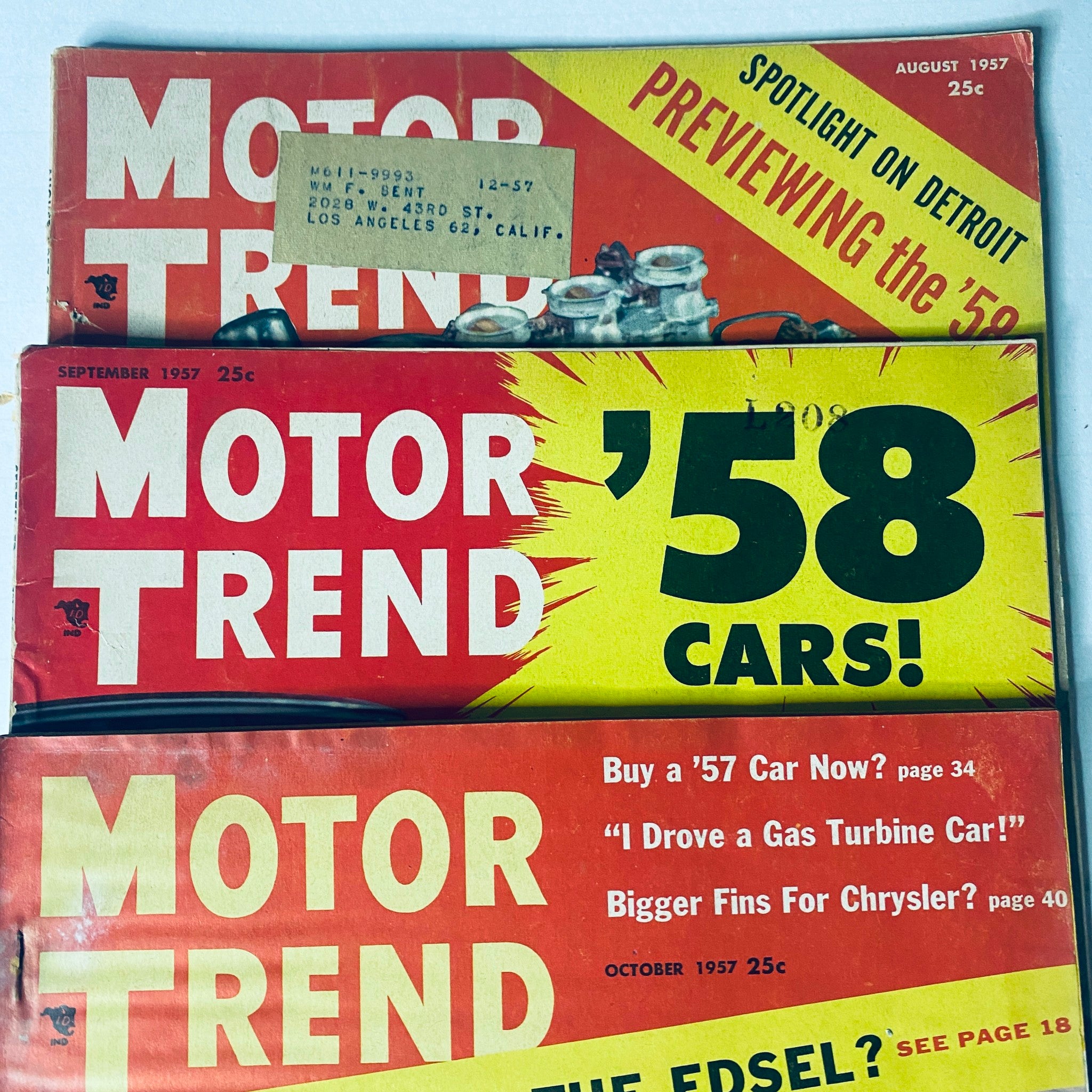 Motor Trend Magazine September and October 1957 issues emphasizing upcoming car models and automotive trends.