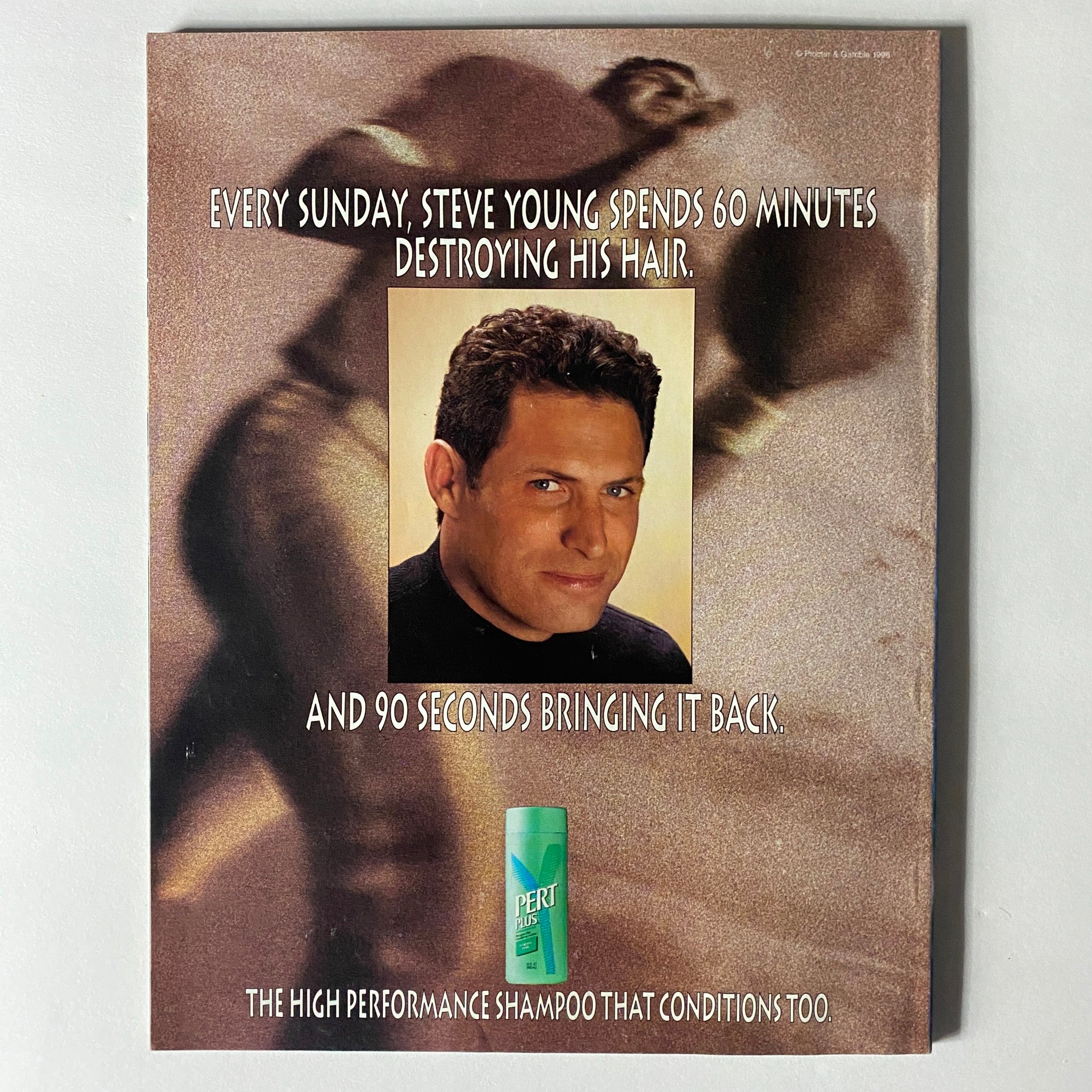 Back cover of Inside Sports Magazine March 1997 showcasing an advertisement for Pert Plus shampoo featuring football player Steve Young, emphasizing performance and hair care, reflective of the magazine's blend of sports and lifestyle.