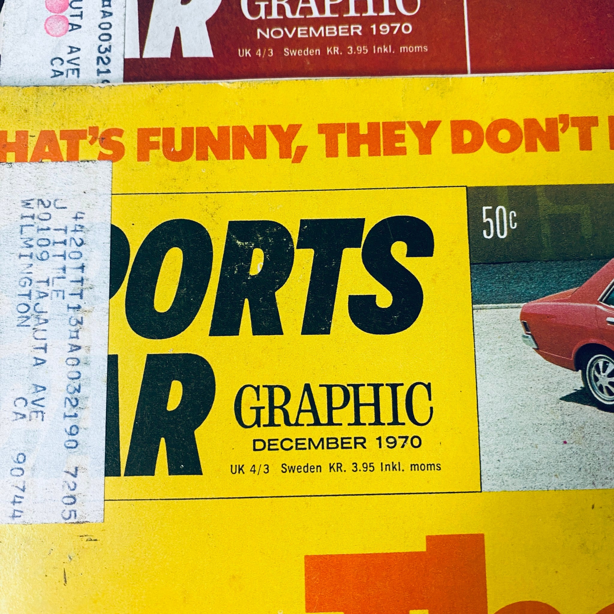 Cover of Sports Car Graphic magazine from December 1970 displaying a classic car with a yellow background emphasizing the magazine's name in bold text. Lot of 10 Sports Car Graphic Magazine 1970 January - April, July - December.