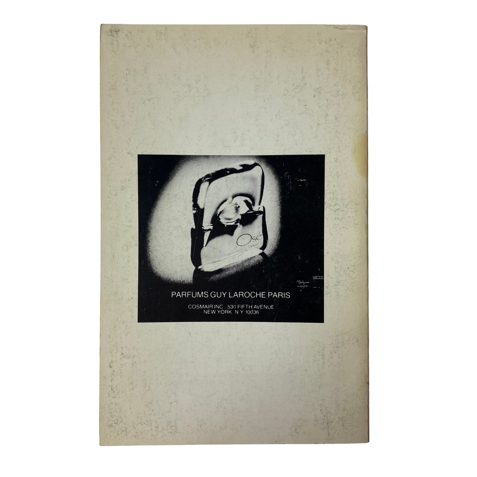 Advertisement page from The Paris Review Magazine Winter-Spring 1980 No. 77 featuring Parfums Guy Laroche Paris.