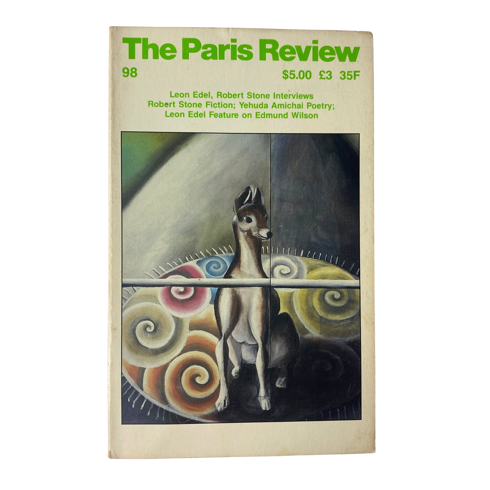 The Paris Review Magazine Winter 1985 No. 98 featuring cover art with a dog portrait against a colorful swirl background. Highlights include interviews with Leon Edel and Robert Stone, and various fiction and poetry contributions.