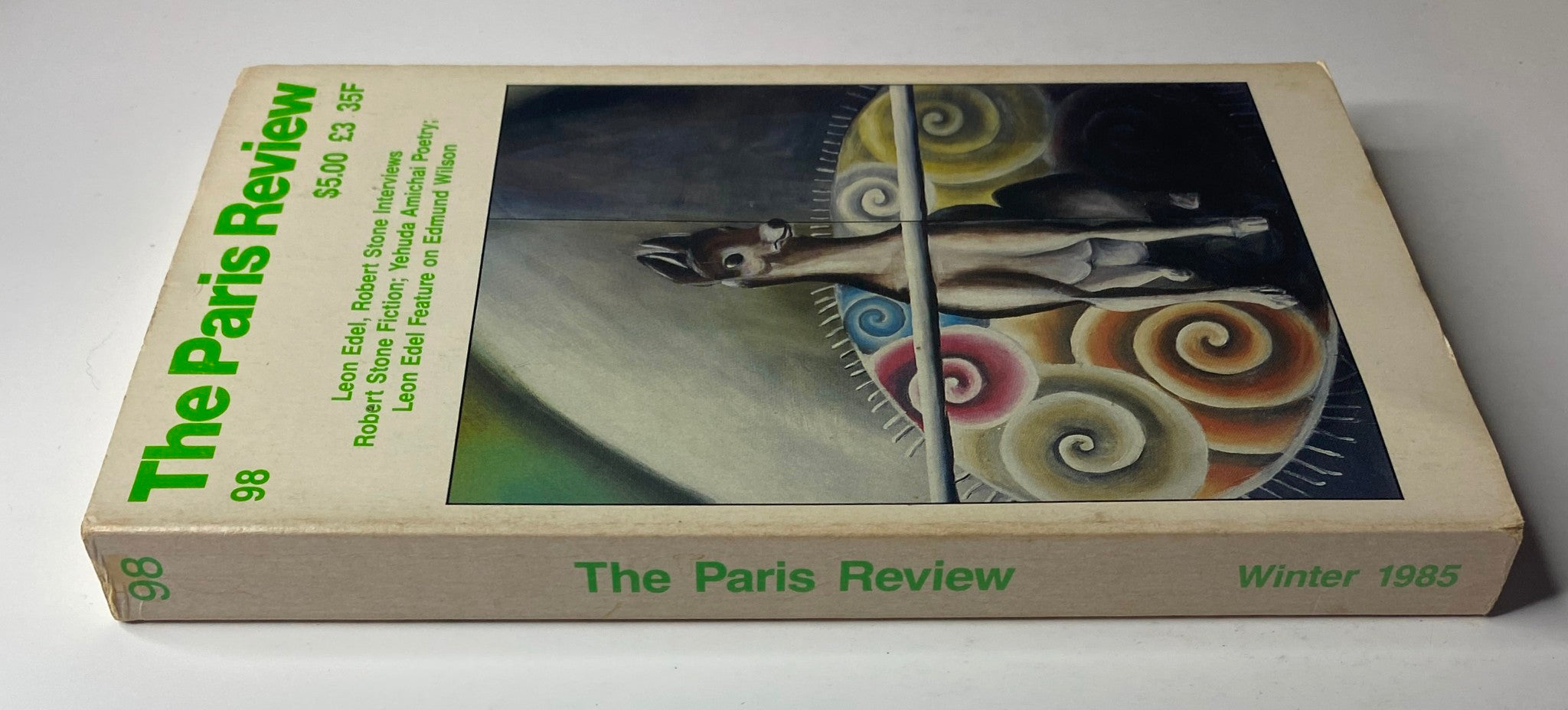 The Paris Review Magazine Winter 1985 No. 98 showing the front cover with a dog illustration and vibrant colors highlighting literary features including Leon Edel and Robert Stone interviews.