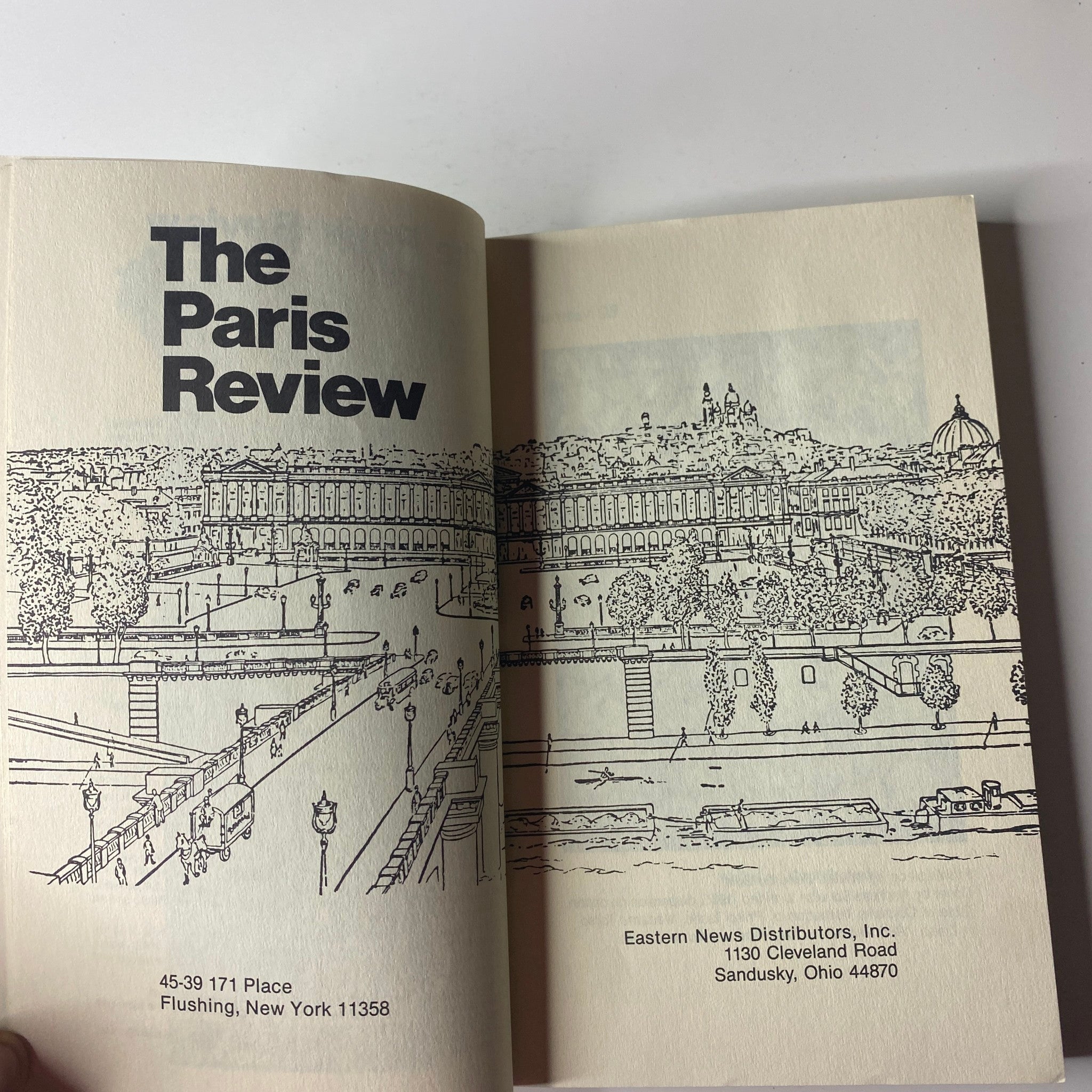 Inside spread of The Paris Review Magazine Winter 1985 No. 98 featuring a line drawing of a scenic view with a building in the background.
