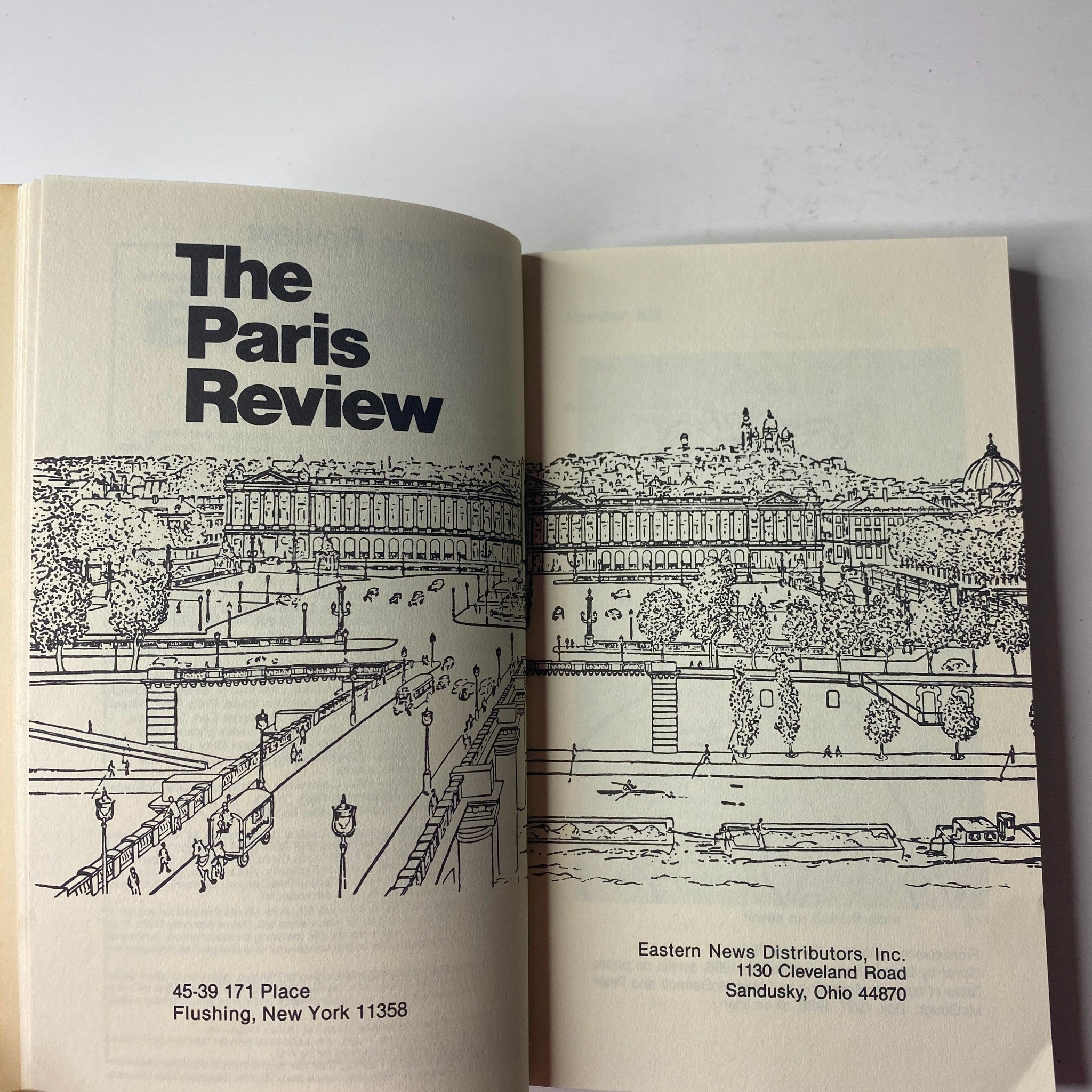 Interior page of The Paris Review Magazine showing the title and a drawing of a scenic landscape, part of the Summer 1987 No. 103 issue.