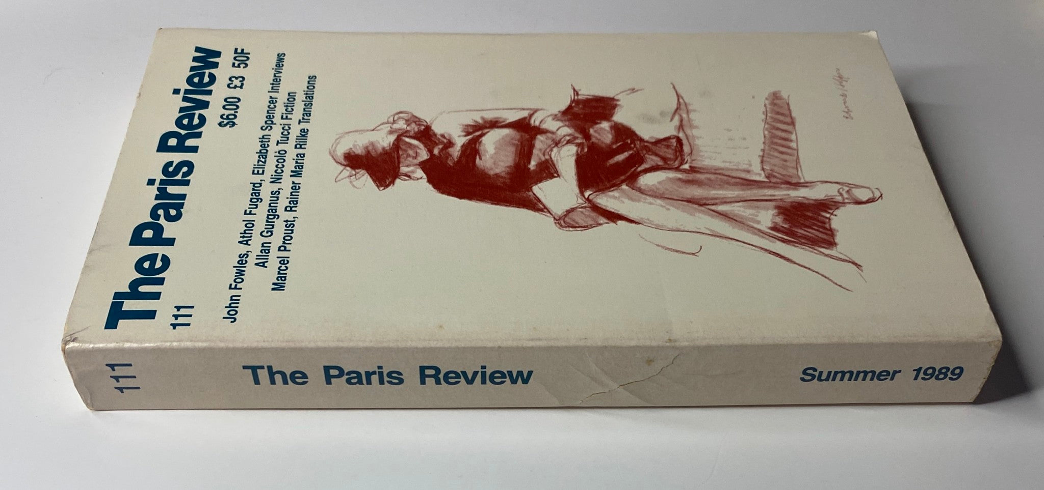 Spine view of The Paris Review Magazine Summer 1989 No. 111 showcasing the title and issue details, indicating its rich content on literature and arts.