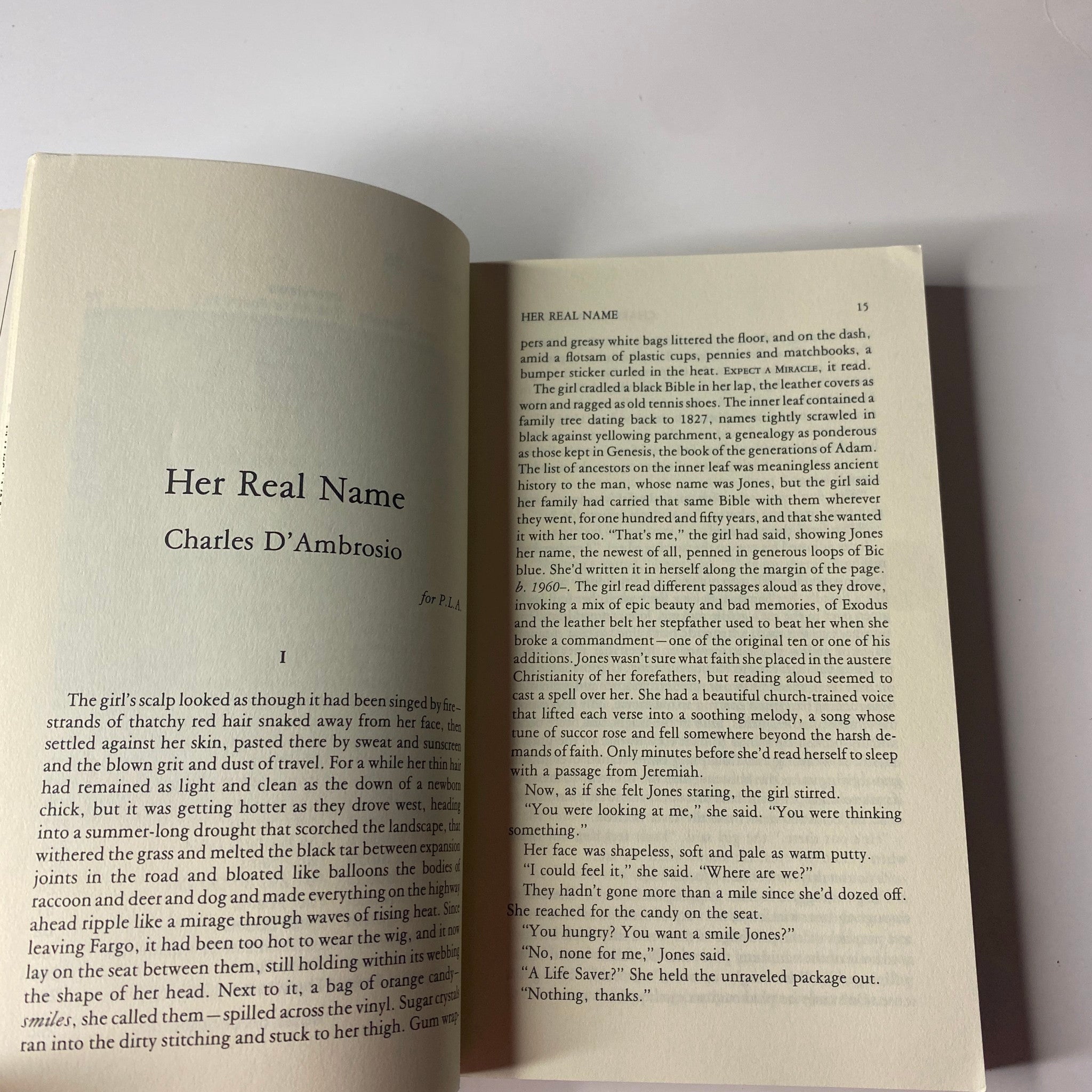 Interior page of The Paris Review Magazine Spring 1993 No. 126 showcasing a fiction piece titled 'Her Real Name' by Charles D'Ambrosio.