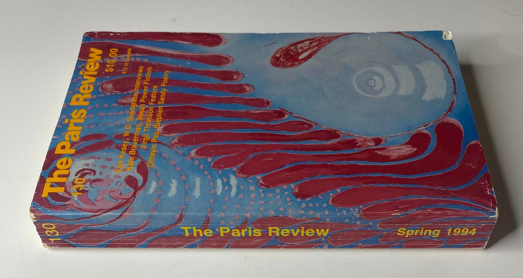 Cover view of The Paris Review Magazine Spring 1994 No. 130 featuring vibrant artwork and text indicating issue details.