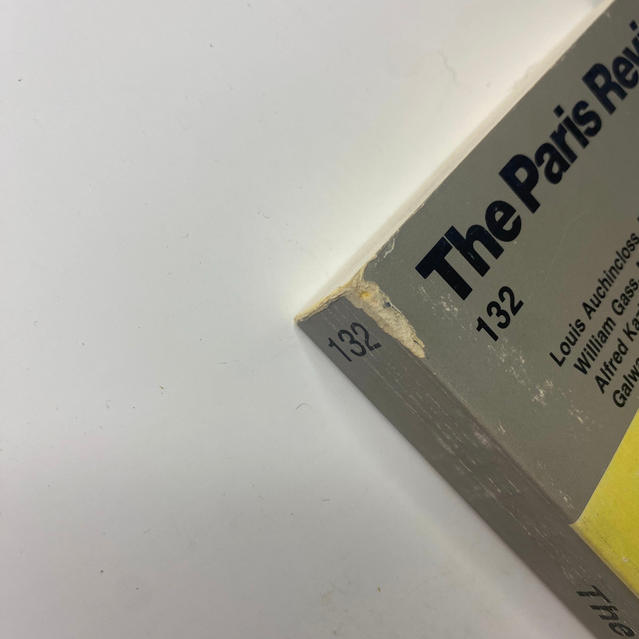 Close-up view of the corner of The Paris Review Magazine Fall 1994 No. 132, showing minor wear and the issue number 132.