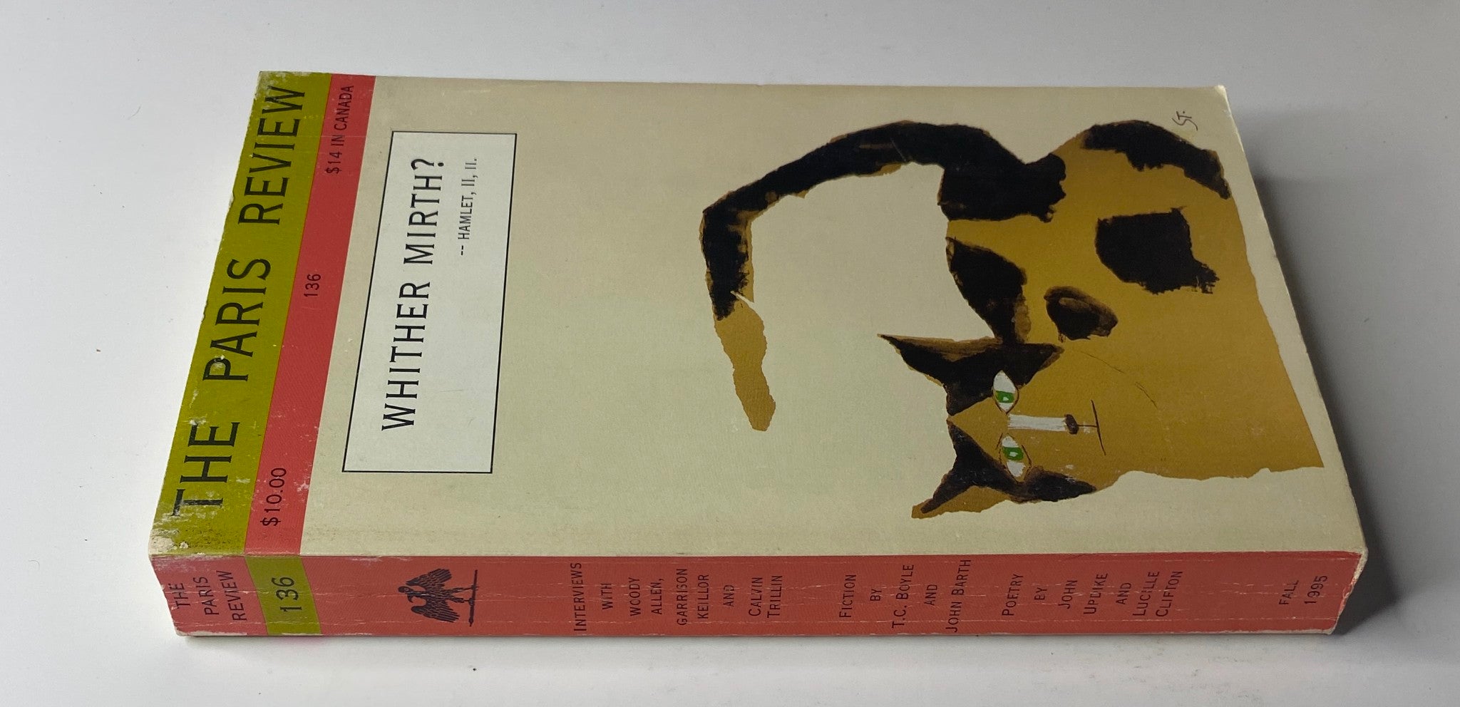 Side view of The Paris Review Magazine Fall 1995 No. 136 showcasing the same whimsical cat illustration and the title 'Whither Mirth? - Hamlet, II, II.' The edition delves into literary humor.