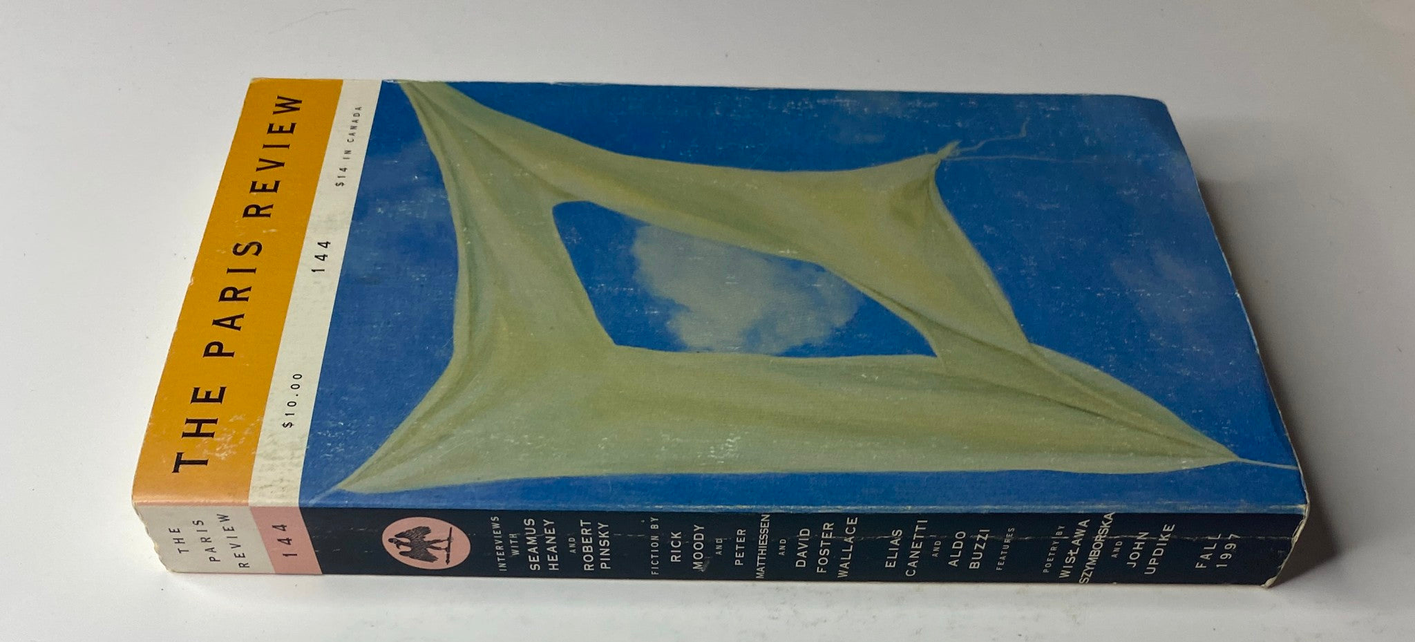 Cover of The Paris Review Magazine Fall 1997 No. 144 featuring artwork and notable authors including David Foster Wallace, Aldo Buzzi, and Elias Canetti.