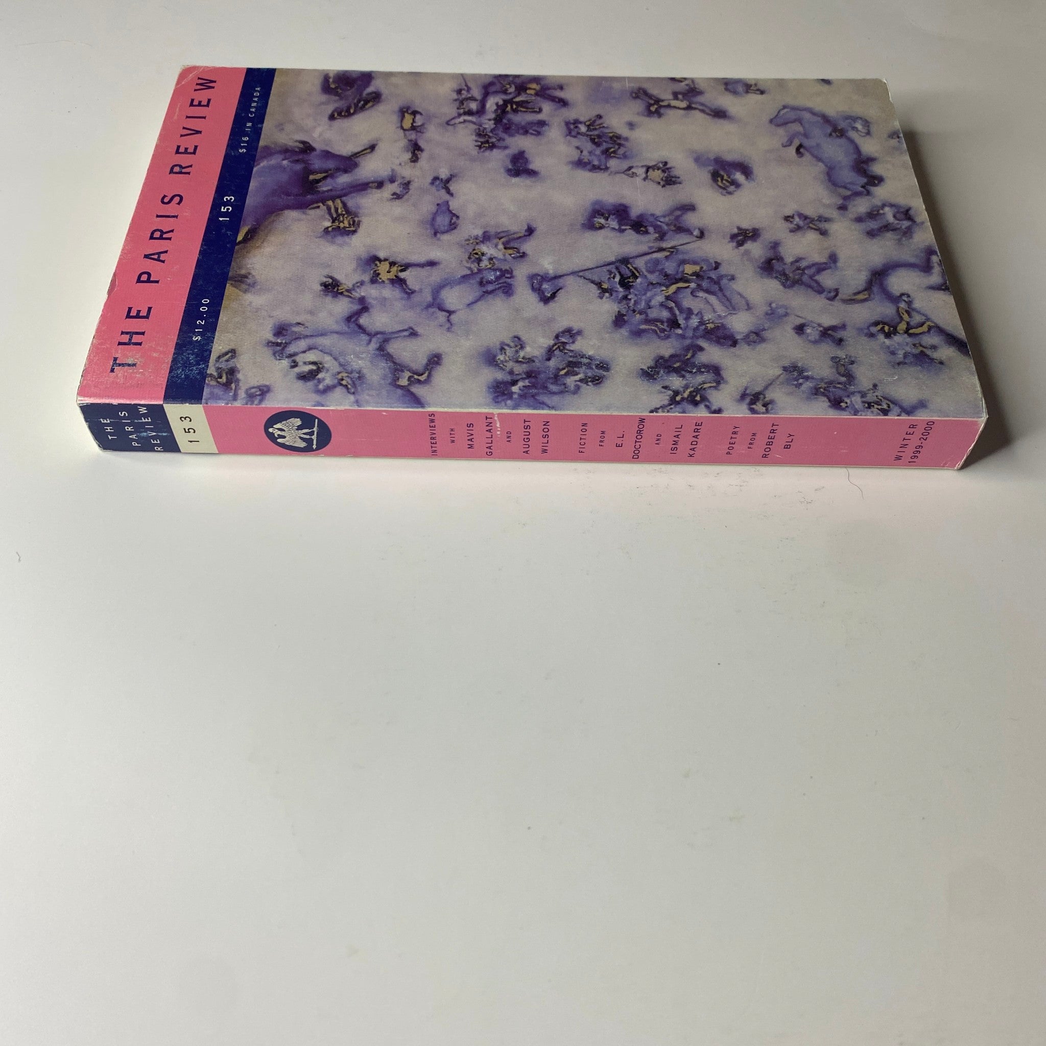 The Paris Review Magazine Winter 1999-2000 No. 153 spine view showcasing its distinct colorful layout.