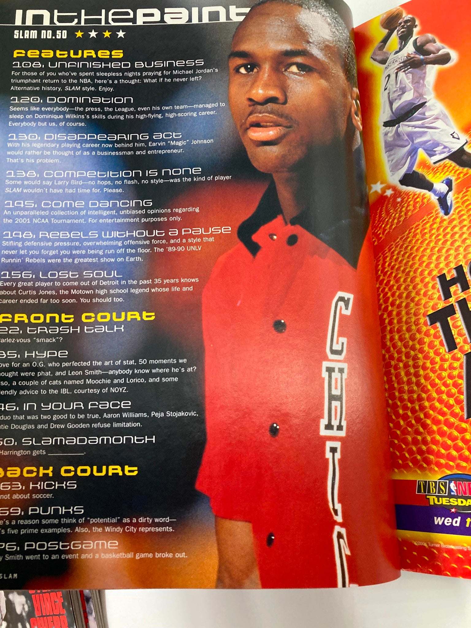 Slam Magazine April 2001 #50 features Michael Jordan on the cover with highlights of basketball trivia and player statistics.
