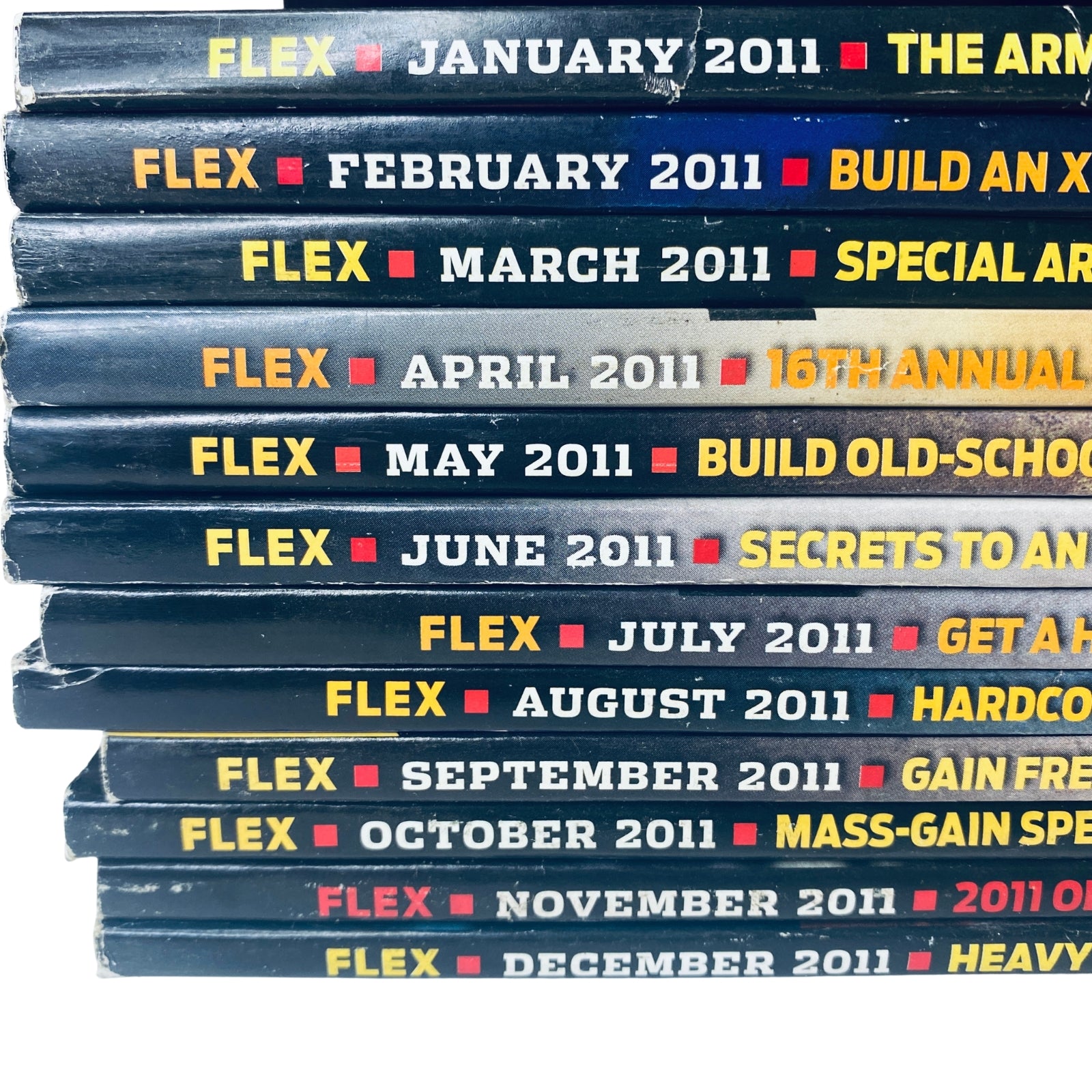 Lot of 12 Flex Magazine 2011 Full Year January - December displaying sequential magazine spines with issue months prominently listed.
