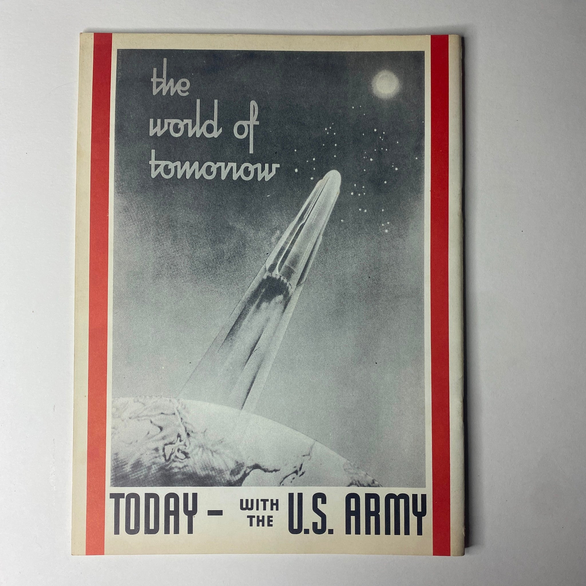 Promotional material titled 'The World of Tomorrow' with a futuristic image, illustrating the non-automotive aspects featured in Road and Track Magazine June 1947.