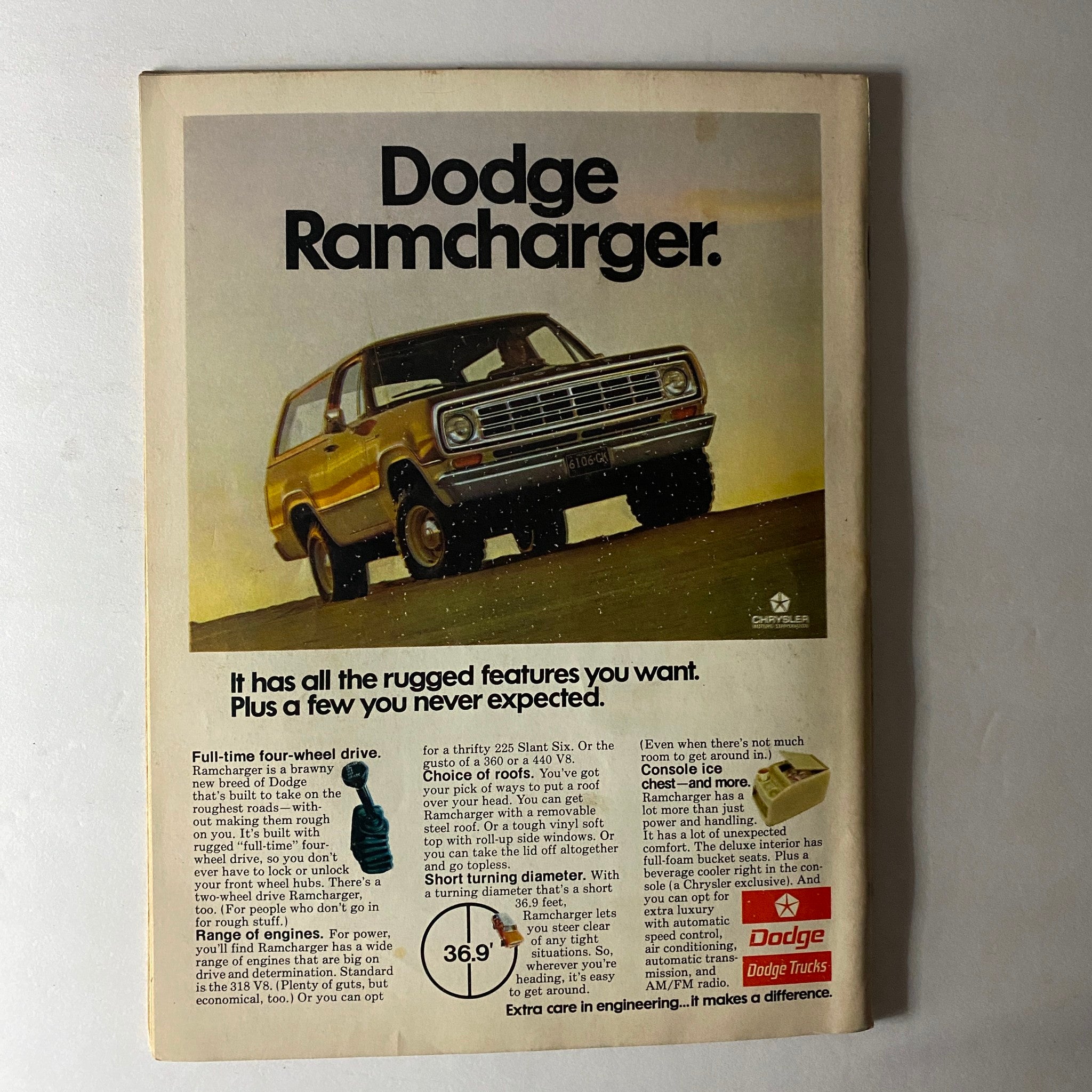Vintage advertisement for Dodge Ramcharger featured in Vintage Pickup, Van & 4WD Magazine July 1975. Showcasing rugged features and specifications of the Dodge Ramcharger SUV, it highlights full-time four-wheel drive, short turning diameter, and choice of engines.