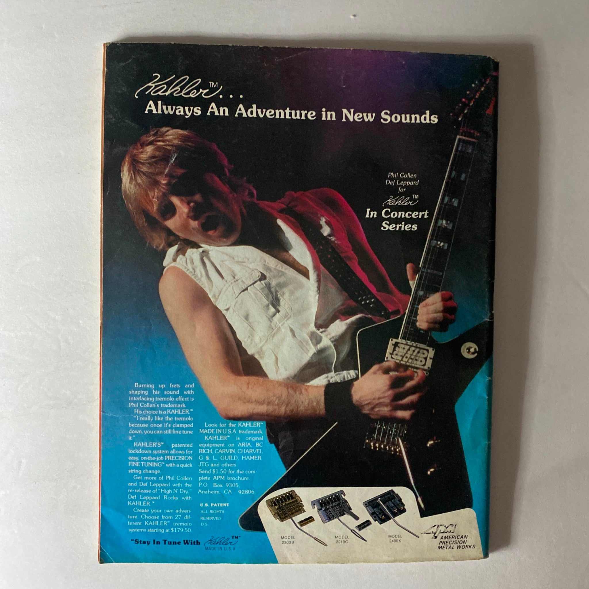 Vintage Guitar Magazine November 1984 advertisement featuring guitarist Phil Collen showcasing Kahler guitar equipment, highlighting the innovative sounds from the rock scene.