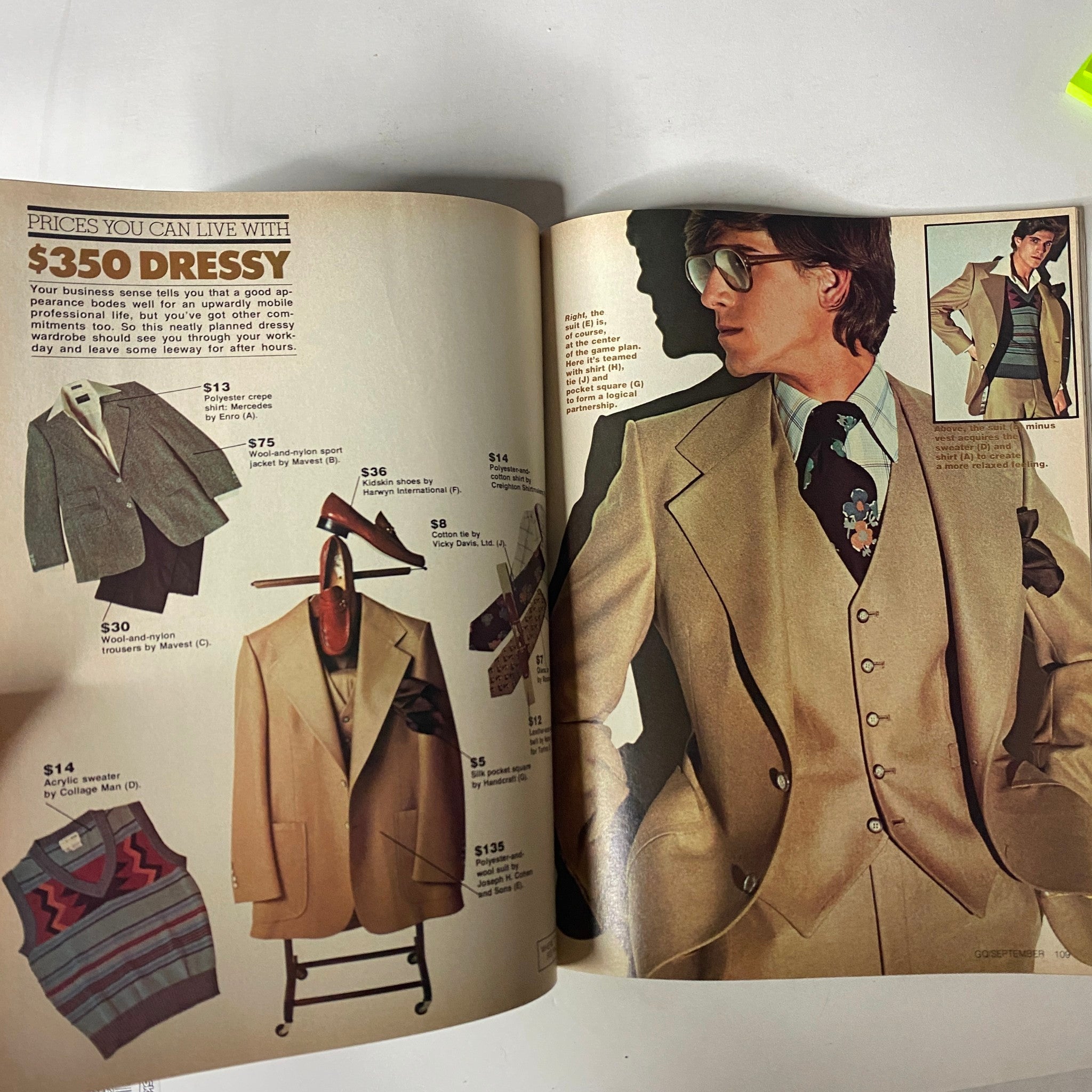 Inside page of GQ Magazine September 1975 displaying a clothing guide with pricing and style suggestions, presenting affordable options for building a fashionable wardrobe.