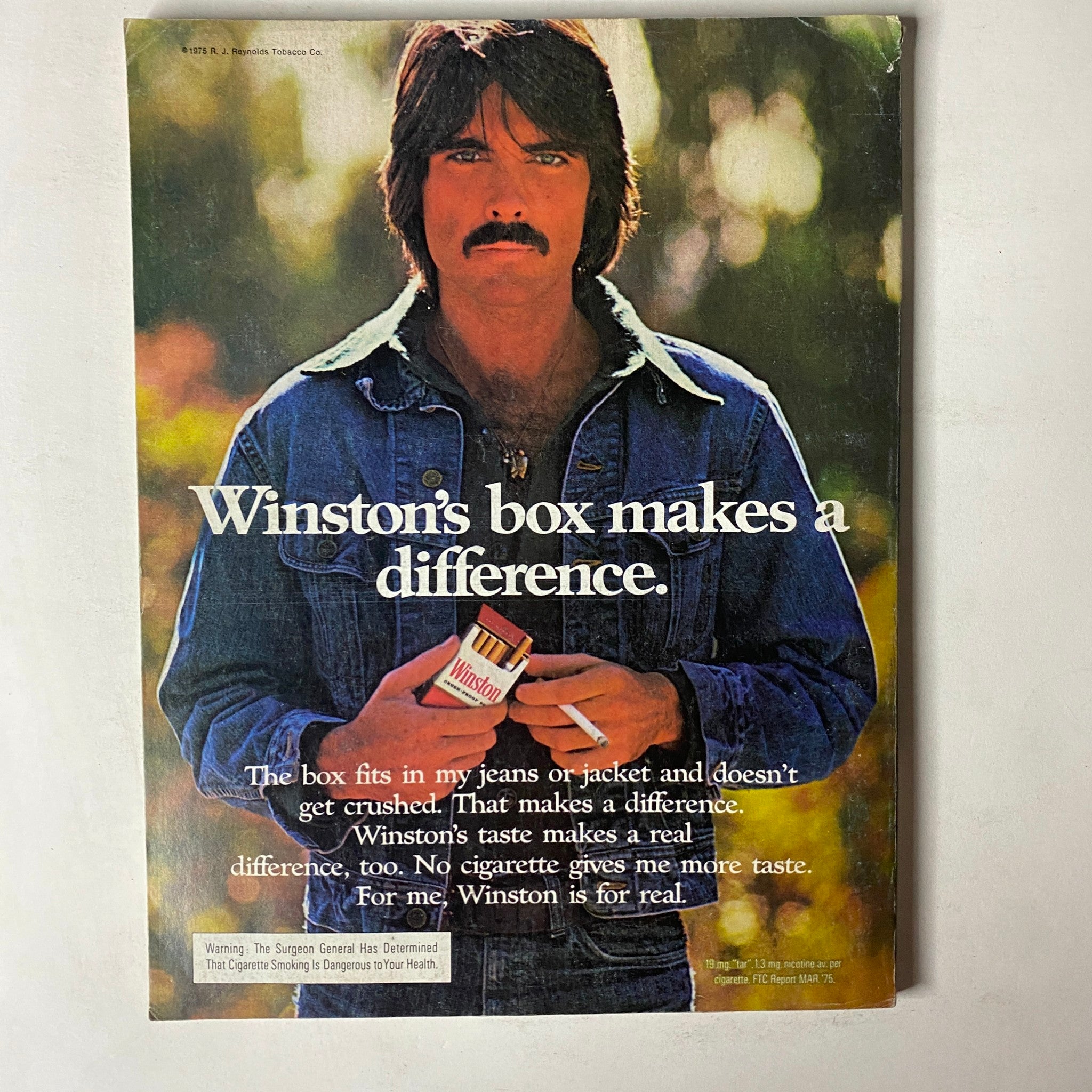 Cover of GQ Magazine September 1975 featuring Denis Lamarsh, showcasing a vintage men's style with themes of fashion and lifestyle.