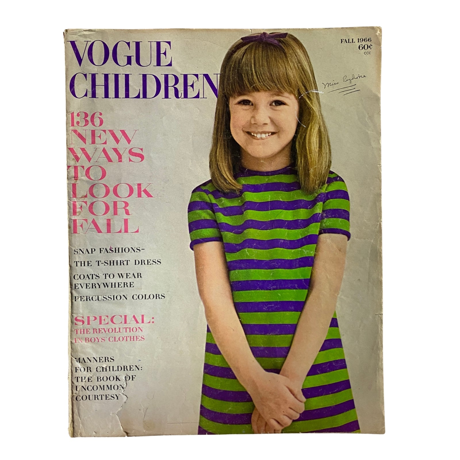 Cover of the 1966 Vogue Children Fall Catalog featuring a young girl in a striped dress, promoting children's fashion trends with text highlighting stylish options for fall.