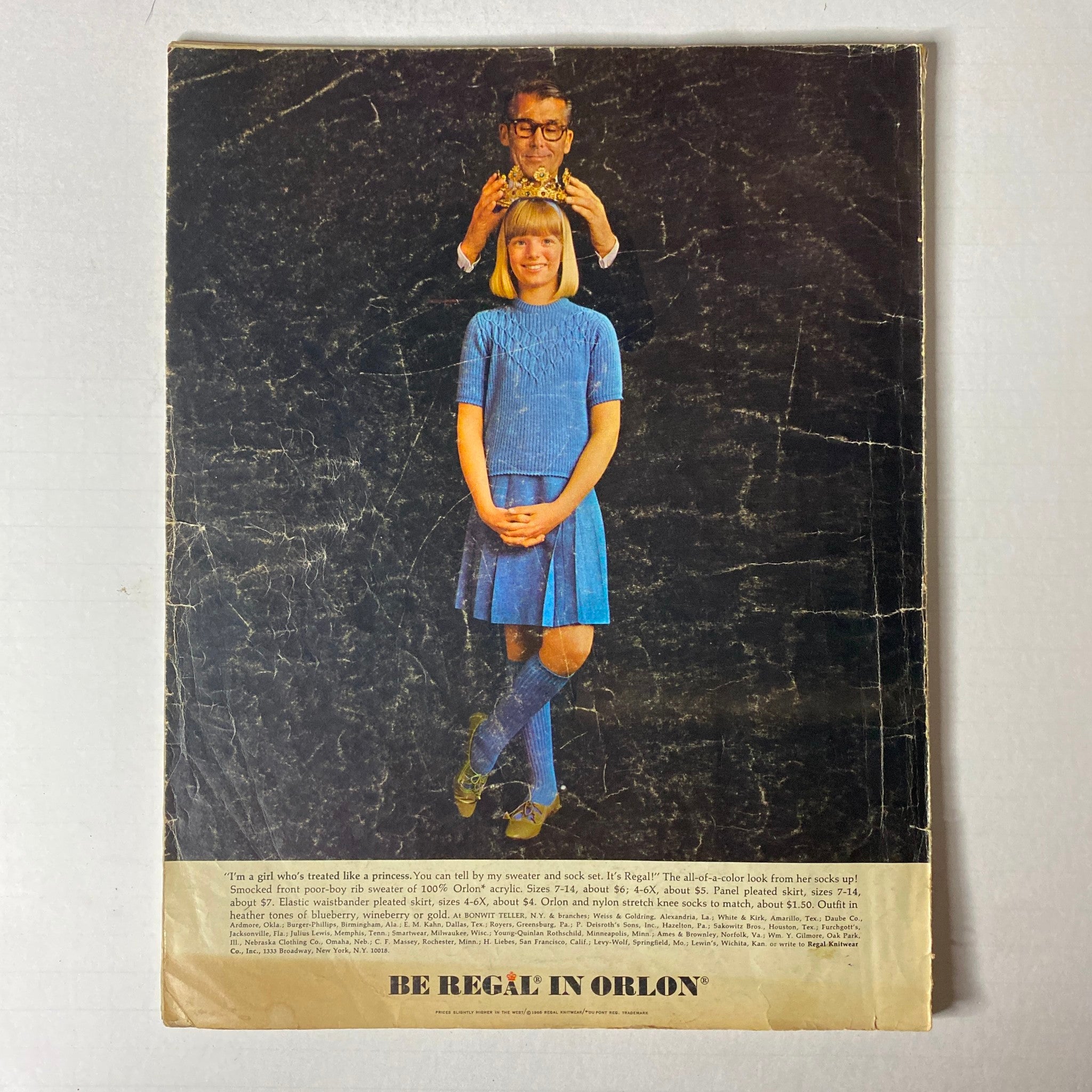 Back cover of the 1966 Vogue Children Fall Catalog featuring a girl in a blue outfit with knee-high socks and a boy in formal wear, promoting fashionable children's clothing options of the 1960s.
