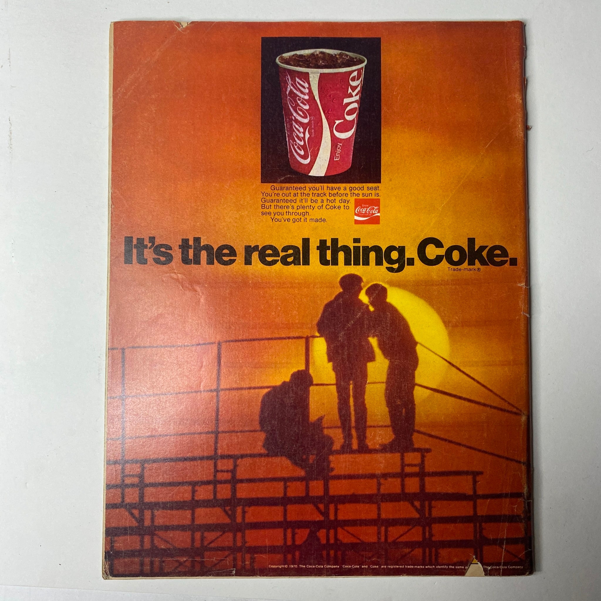 Back cover image of Car Craft Magazine September 1970, featuring a vintage Coca-Cola advertisement with a sunset backdrop and silhouettes of three individuals, emphasizing the nostalgic appeal of the era.