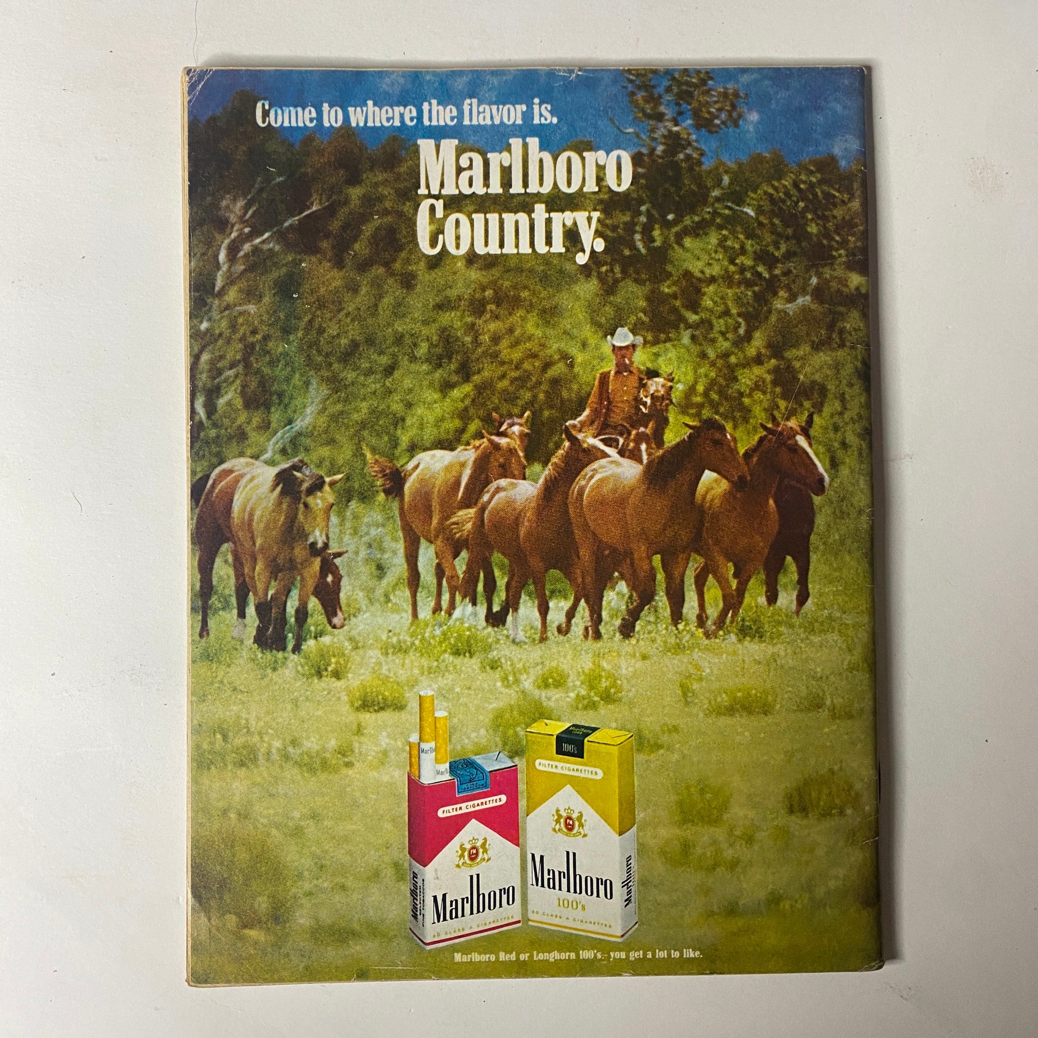 Vintage advertisement from Car Craft Magazine February 1970 Vol 18 No 2 for Marlboro Country, depicting horses and the iconic Marlboro cigarette packaging.
