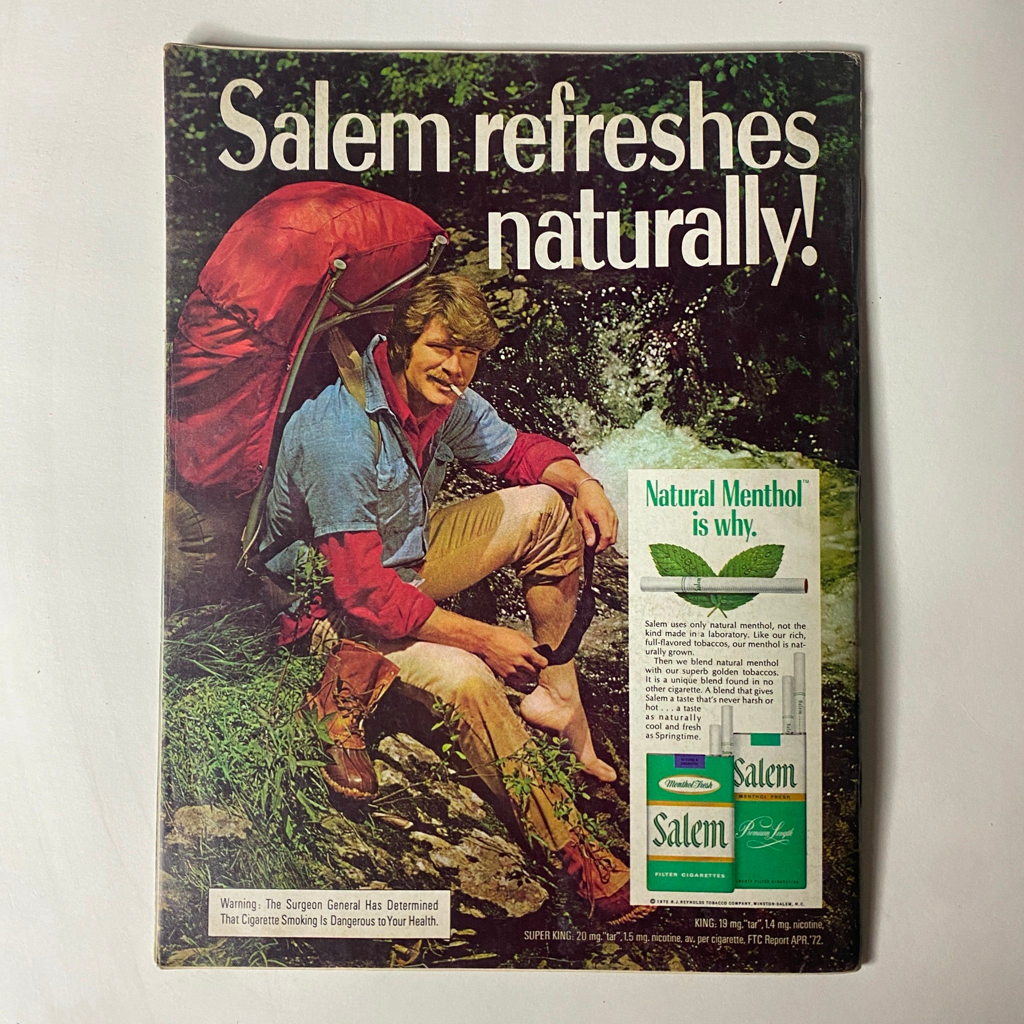 Salem tobacco advertisement in Car Craft Magazine November 1972 showcasing a man relaxing by a stream, emphasizing the natural menthol quality of Salem cigarettes.