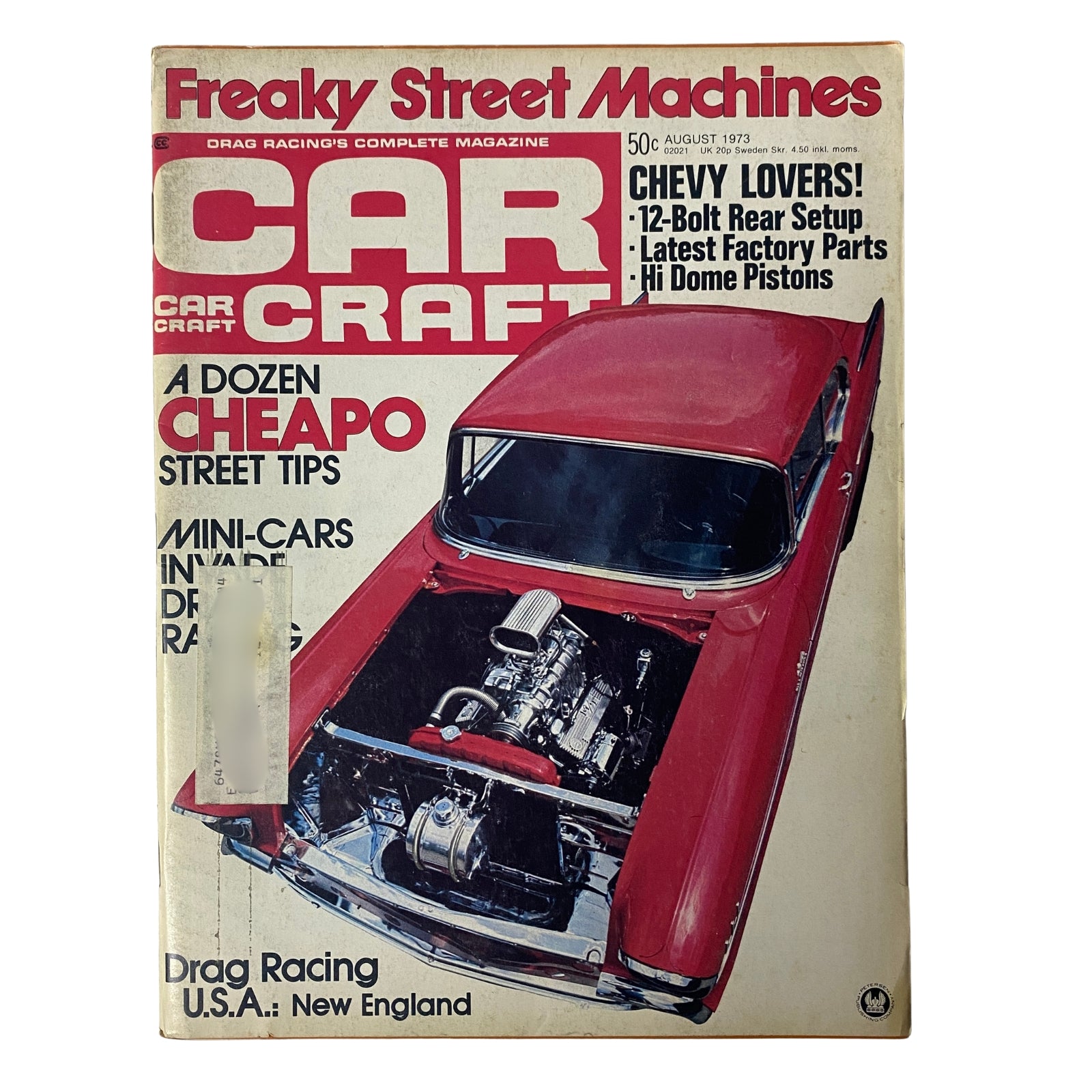 Car Craft Magazine cover from August 1973 featuring the article 'A Dozen Cheapo Street Tips.' The cover highlights a 1957 Chevy showcasing a powerful engine setup, making it an essential read for car enthusiasts and budget-minded builders.