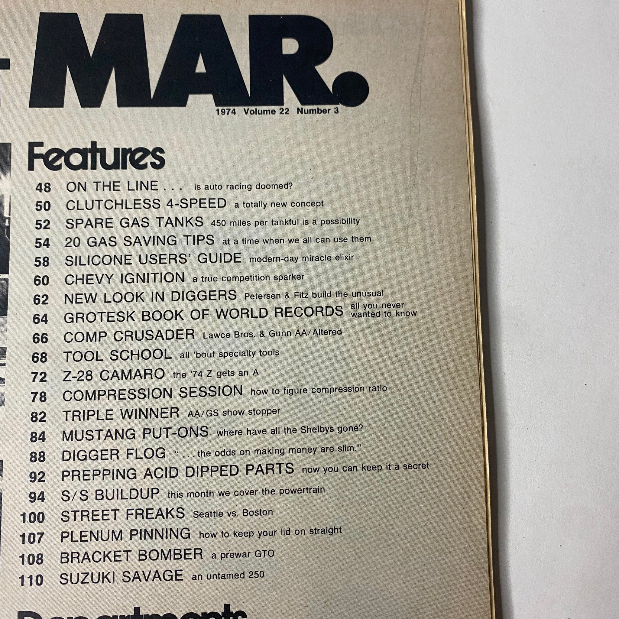 Inside the March 1974 issue of Car Craft Magazine, Vol 22 No 3, showcasing features such as 'Clutchless 4-Speed' and 'Z-28 Camaro' with a focus on car performance and upgrades.