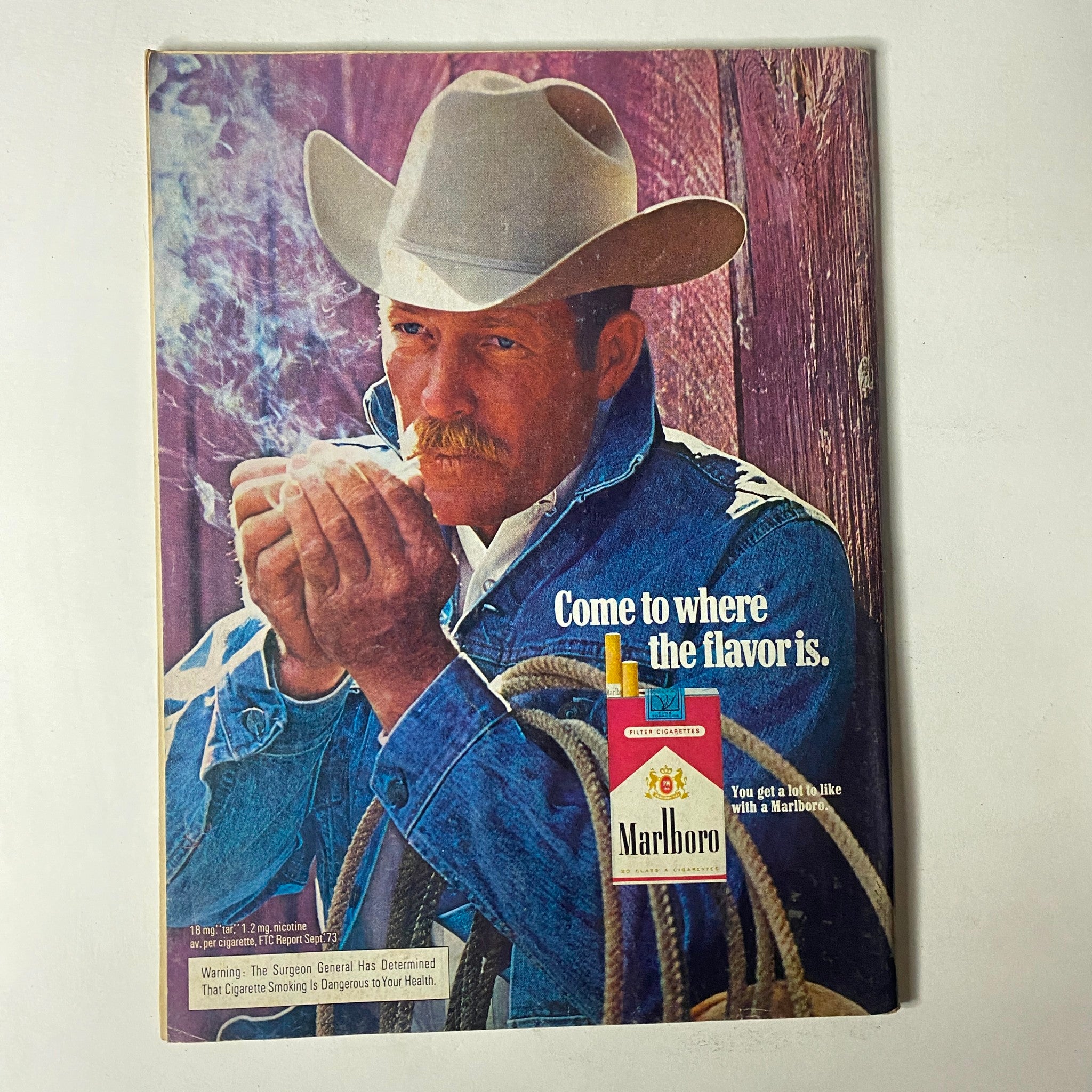 Back cover of Car Craft Magazine April 1974 Vol 22 No. 4 featuring a Marlboro cigarette advertisement with a cowboy holding a rope.