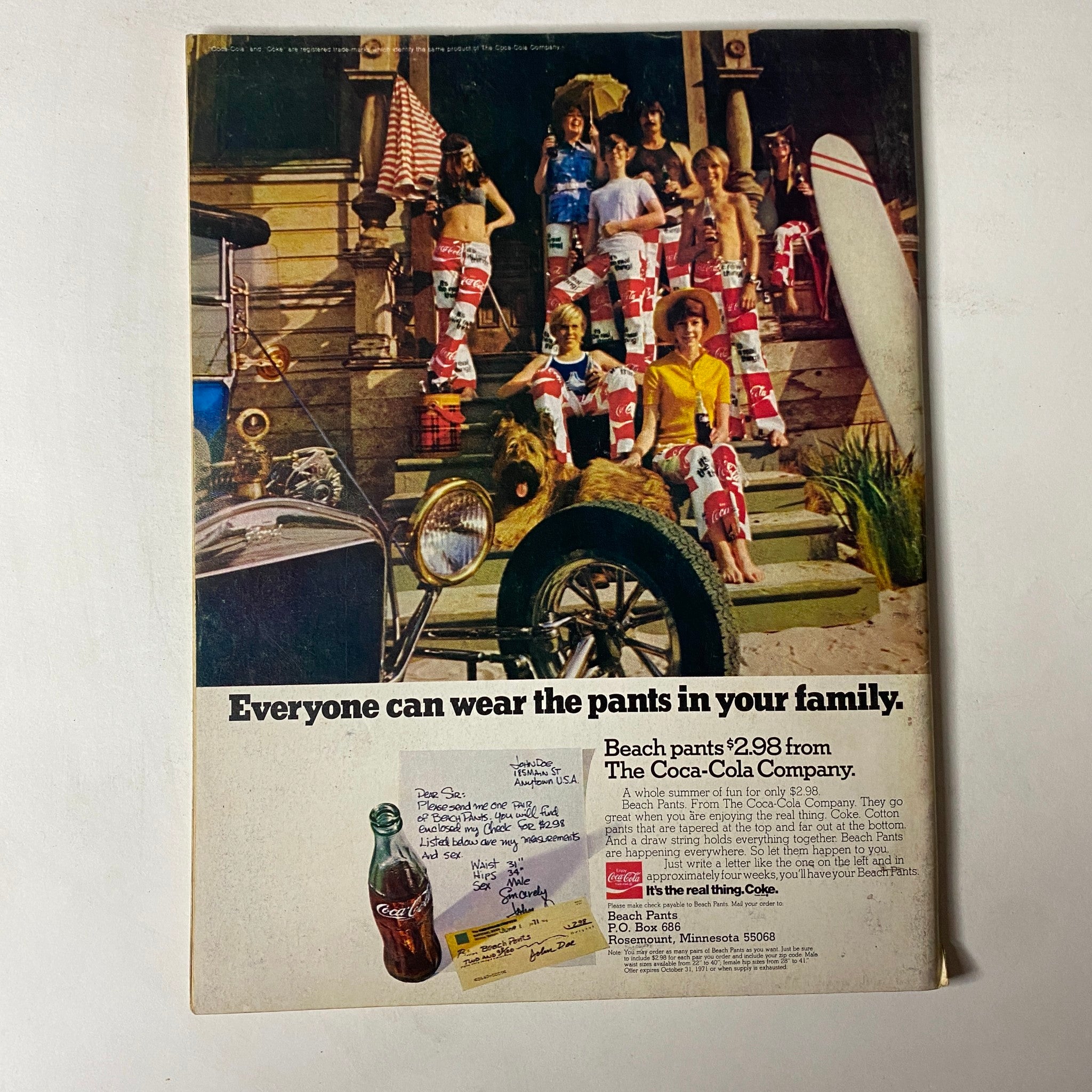Advertisement in Car Craft Magazine June 1971 featuring a group of people wearing colorful beach pants, promoting Coca-Cola with a nostalgic beach theme.