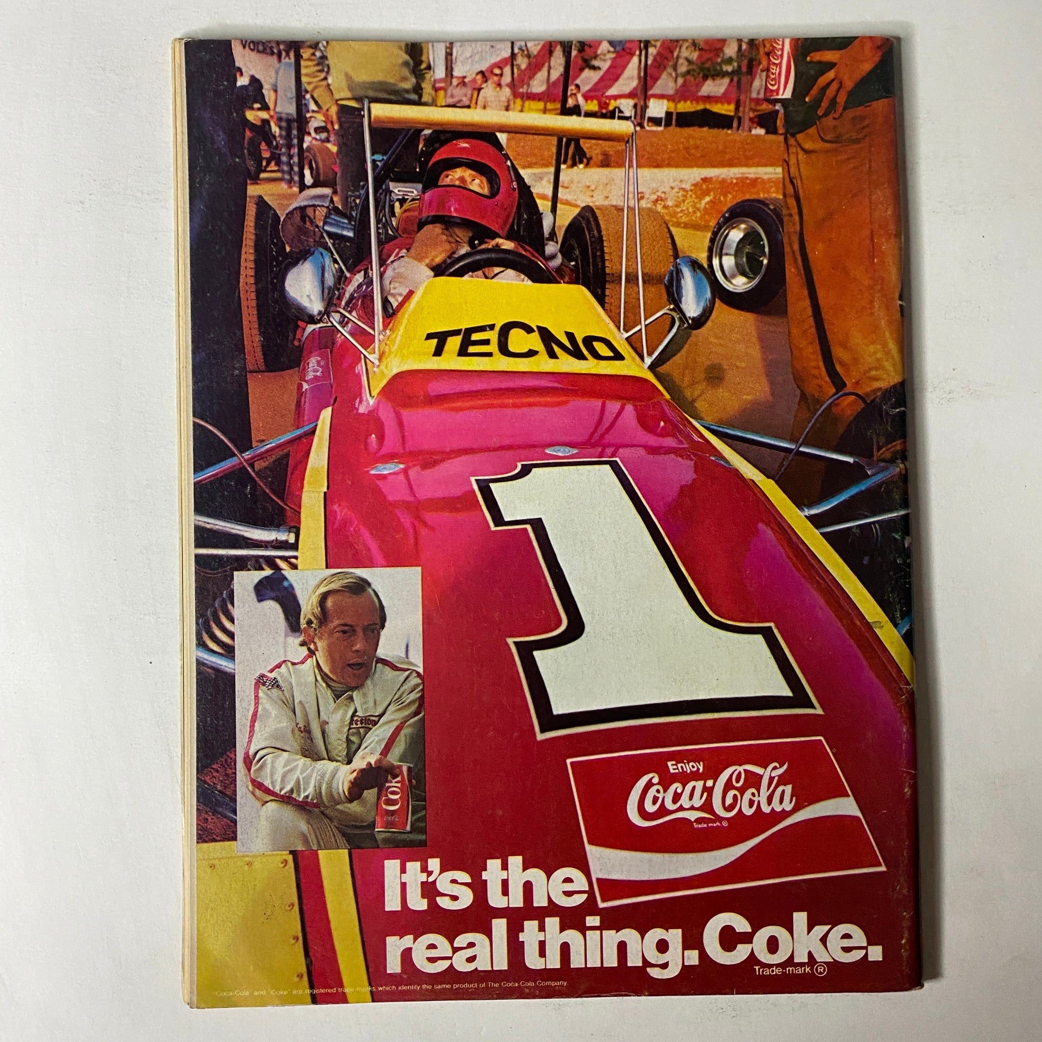 Back cover of Car Craft Magazine July 1971, Vol 19 No. 7 featuring a vintage Coca-Cola advertisement with a race car driver, reflecting the cultural connections between racing and brands.