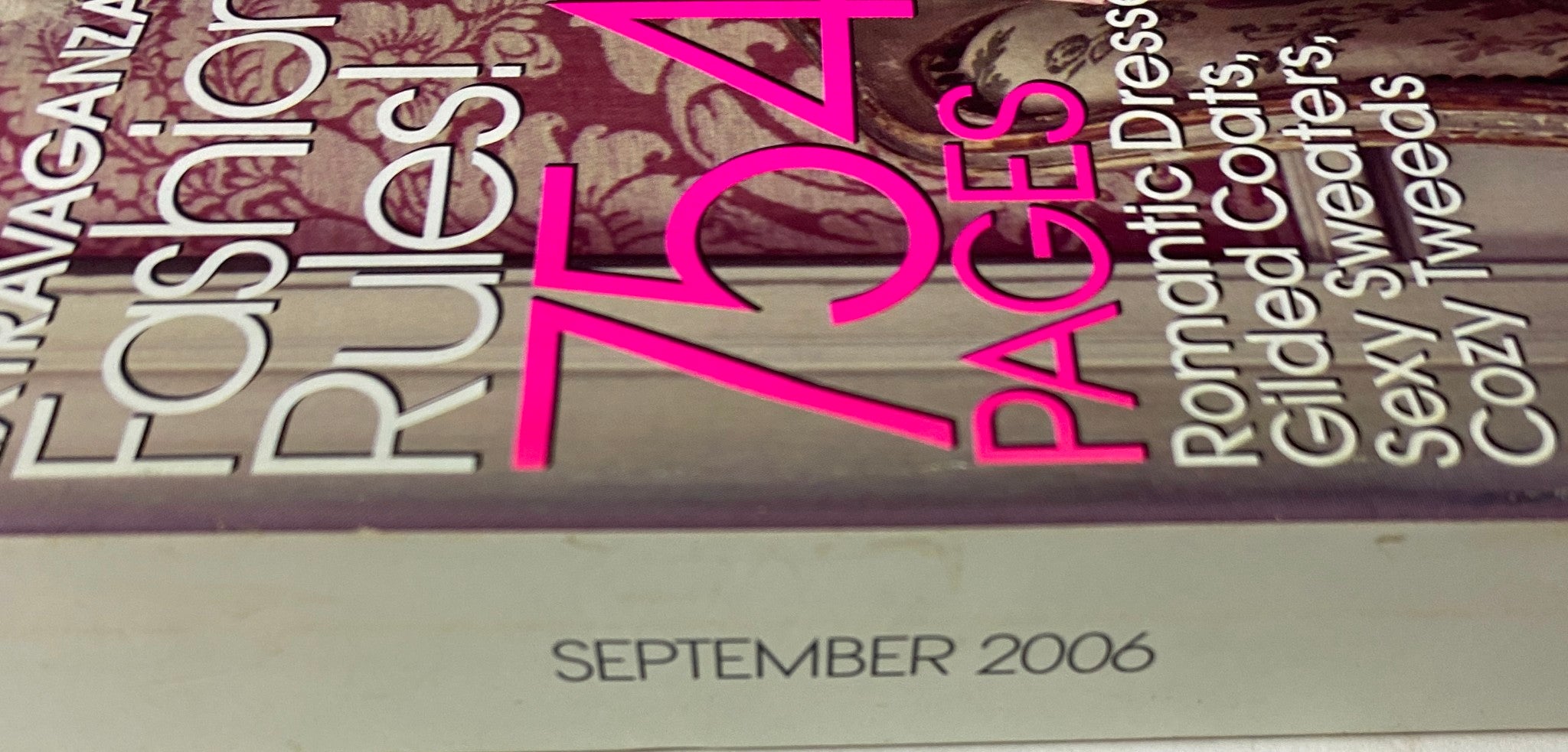 Close-up detail of the Vogue Magazine September 2006 cover, showing the publication date and tagline 'Fashion Rules!' emphasizing its fashion-centric content.