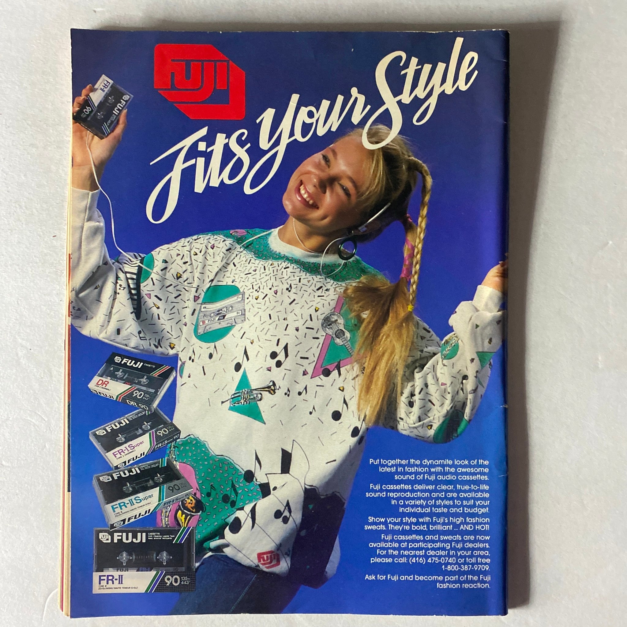 Advertisement page from the back of VTG Graffiti Magazine February/March 1988 promoting Fuji products with a model wearing colorful 1980s fashion, reflecting the era's style.