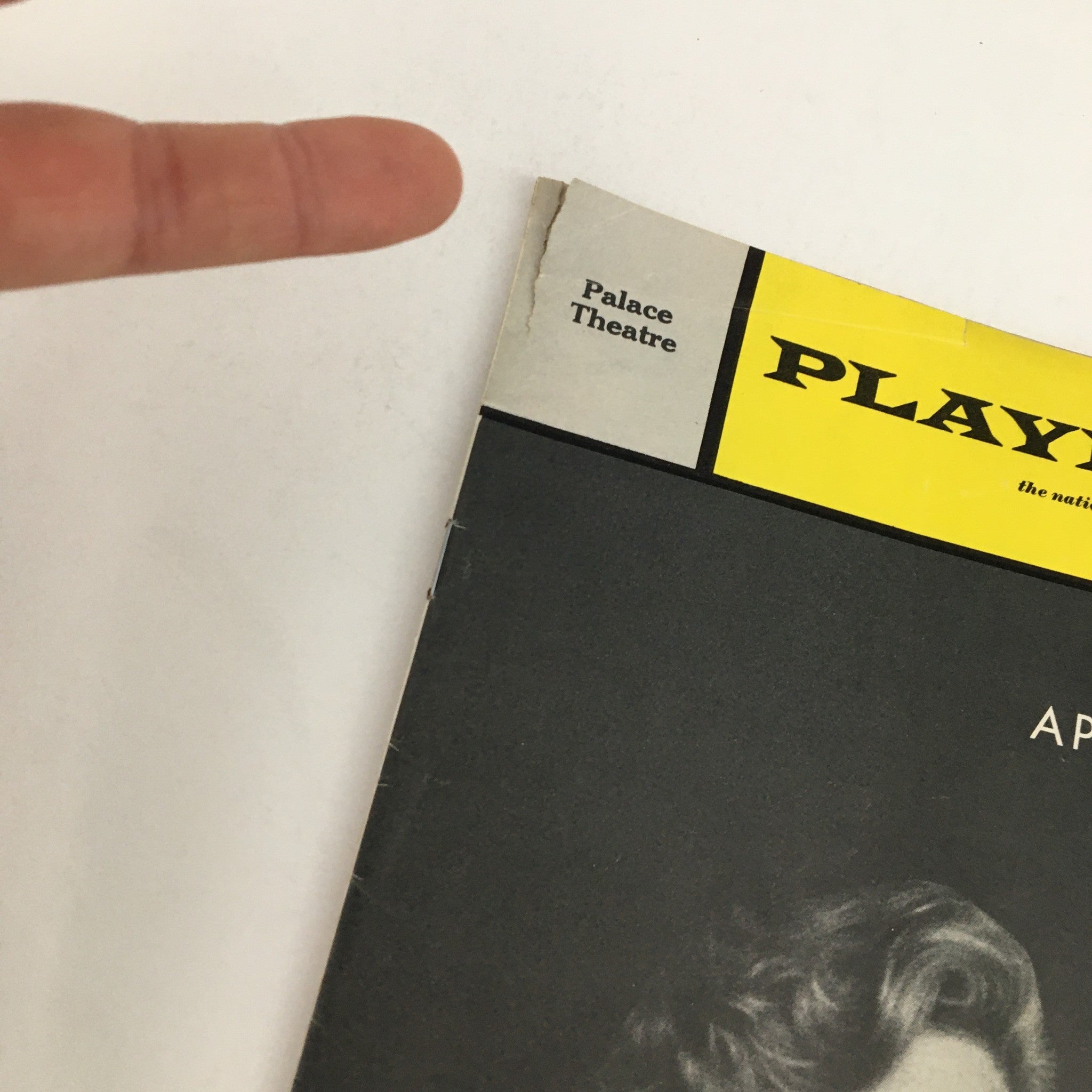 Close-up of the top corner of the 1971 Playbill for Applause, highlighting minor wear and the Palace Theatre branding.